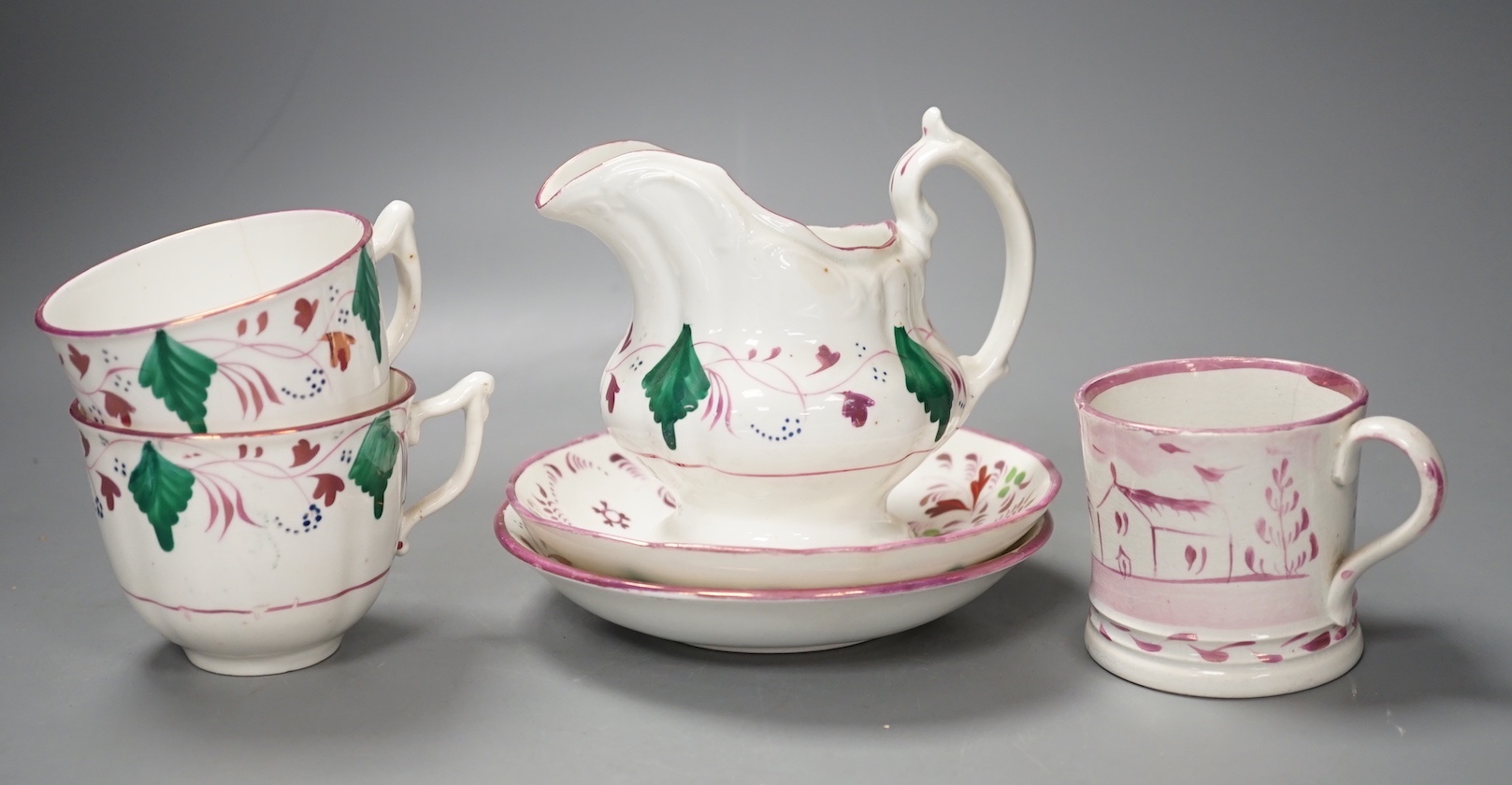 A collection of Welsh or English pink lustre pottery tea wares, first half 19th century                                                                                                                                     