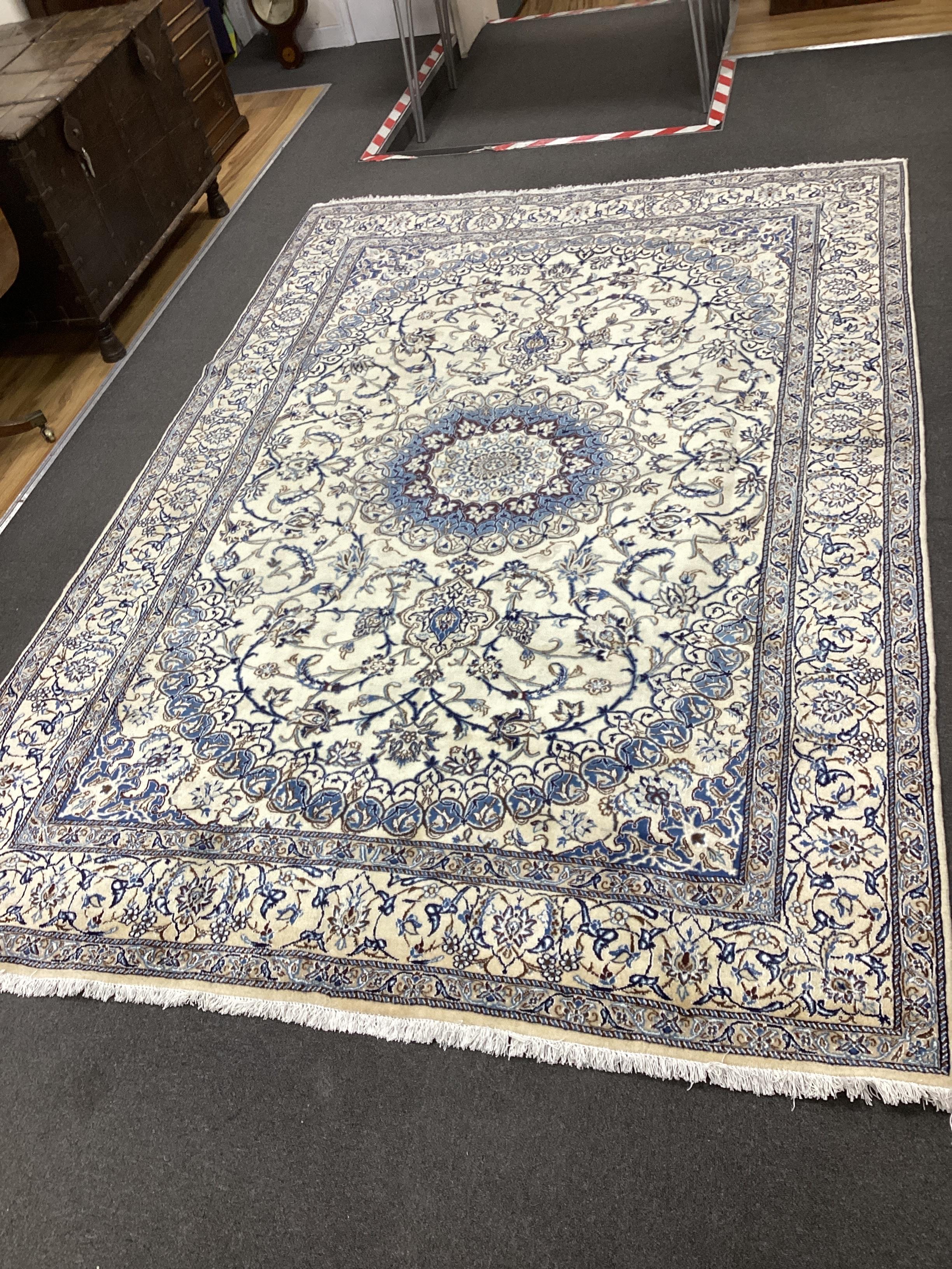A fine Nain ivory ground carpet, 286 x 195cm                                                                                                                                                                                