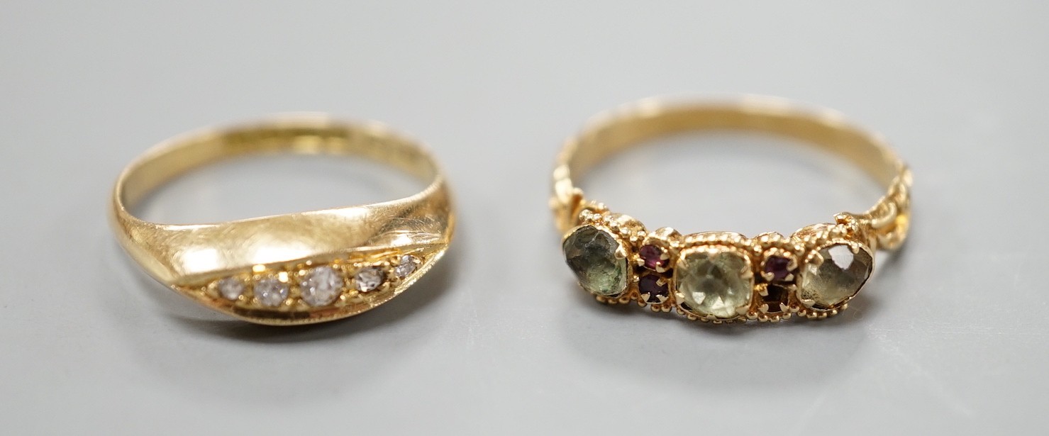 A George V 18ct gold and graduated five stone diamond chip set half hoop ring, size L/M, gross 2.4 grams and a Victorian yellow metal and gem set ring (stone missing), gross 1.8 grams.                                    