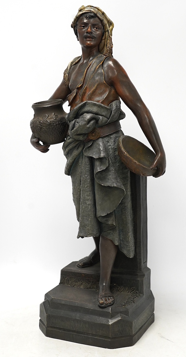 A large Austrian cold painted terracotta figure of a street seller, 59cm high. Condition - fair to good, minor chips                                                                                                        