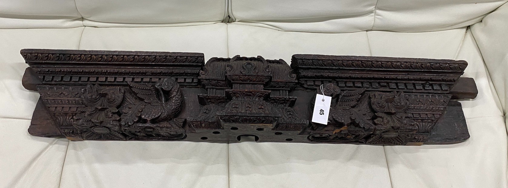 A 19th century Anglo Indian carved pediment, length 112cm, height 19cm                                                                                                                                                      
