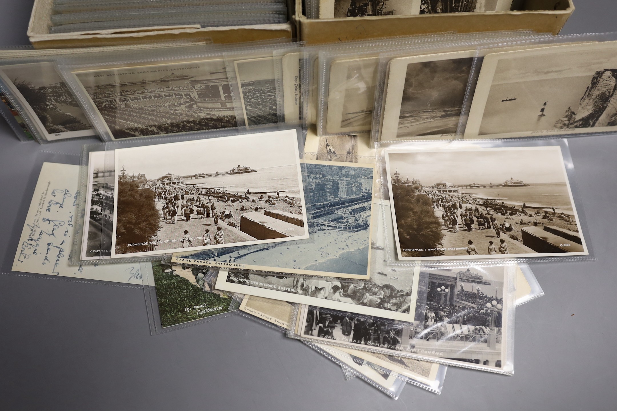 A quantity of postcards relating to Sussex towns                                                                                                                                                                            