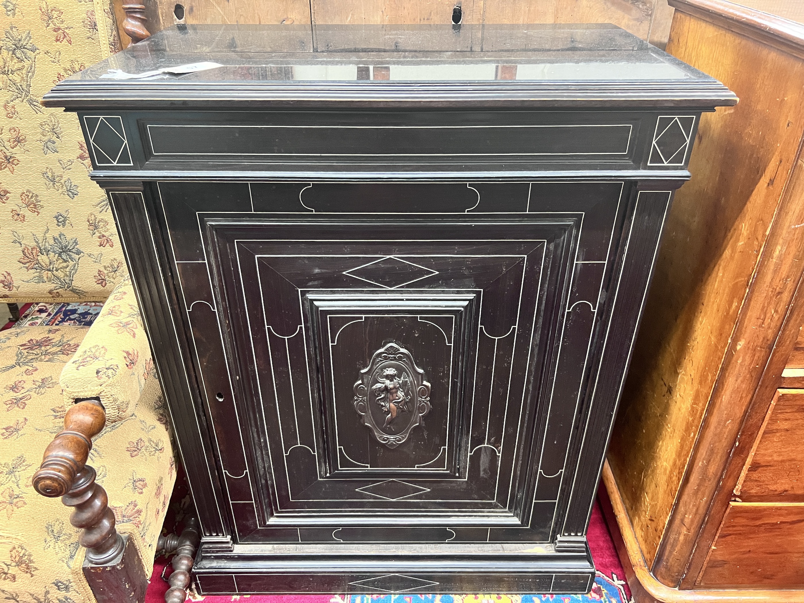 A French ebonised marble top pier cabinet, width 79cm, depth 43cm, height 99cm                                                                                                                                              