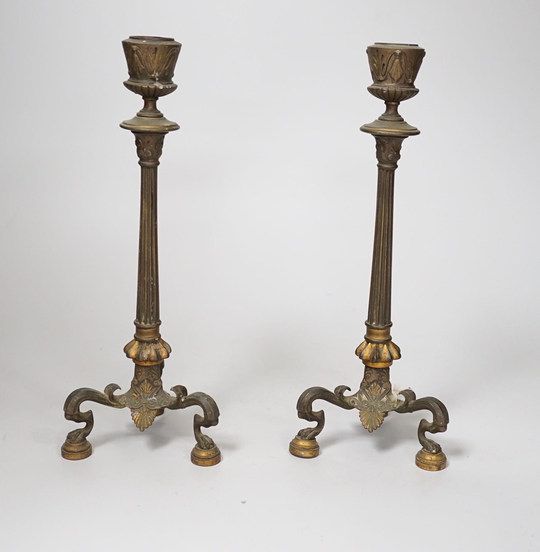 A pair of early 19th century brass candlesticks, 26cm                                                                                                                                                                       