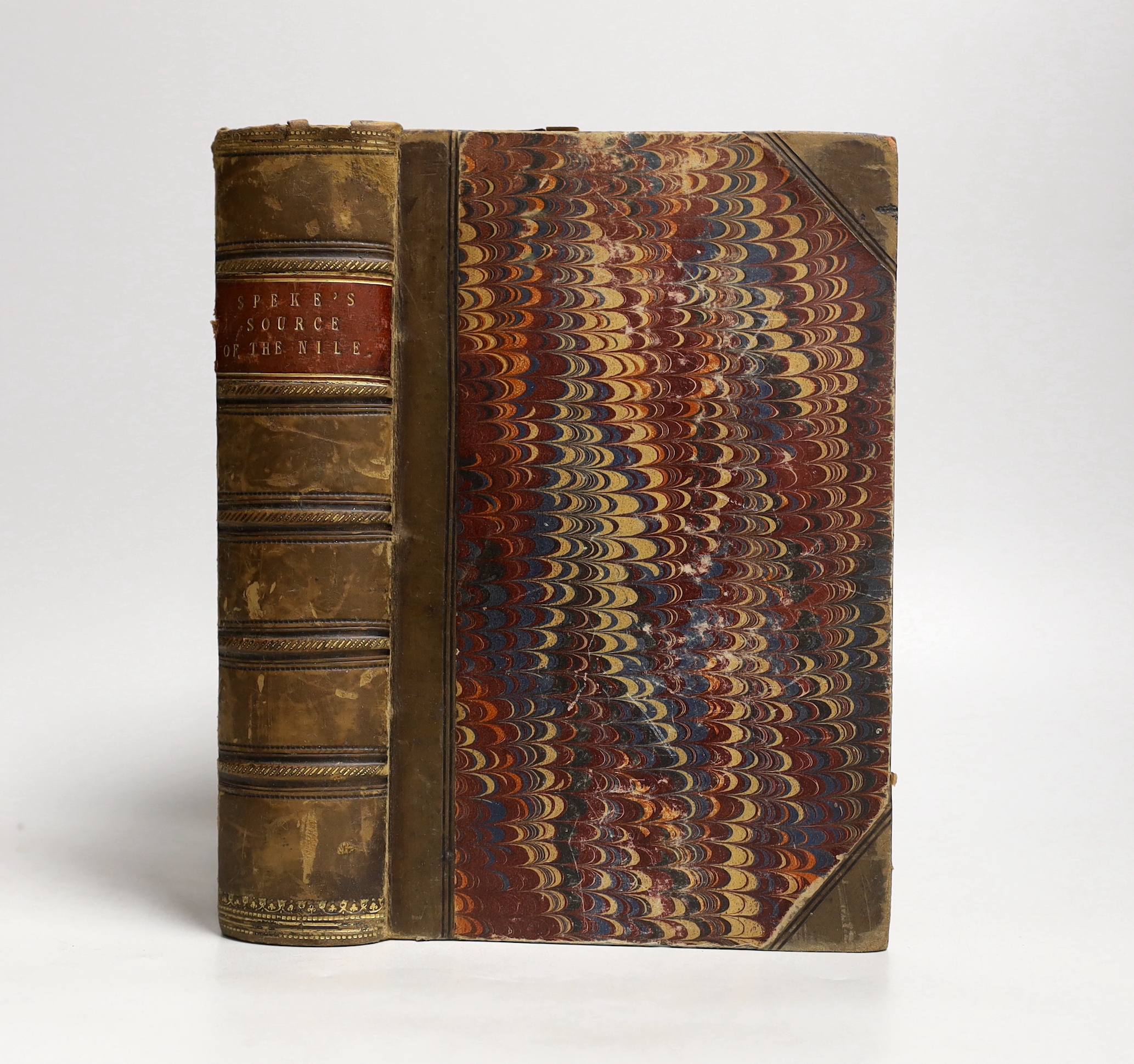 Speke, John Hanning - Journal of the Discoveries of the Source of the Nile. 2 photograv. portraits, 2 maps (1 folded, 1 coloured), 24 plates; old half calf and marbled boards, gilt panelled spine with maroon label, marbl