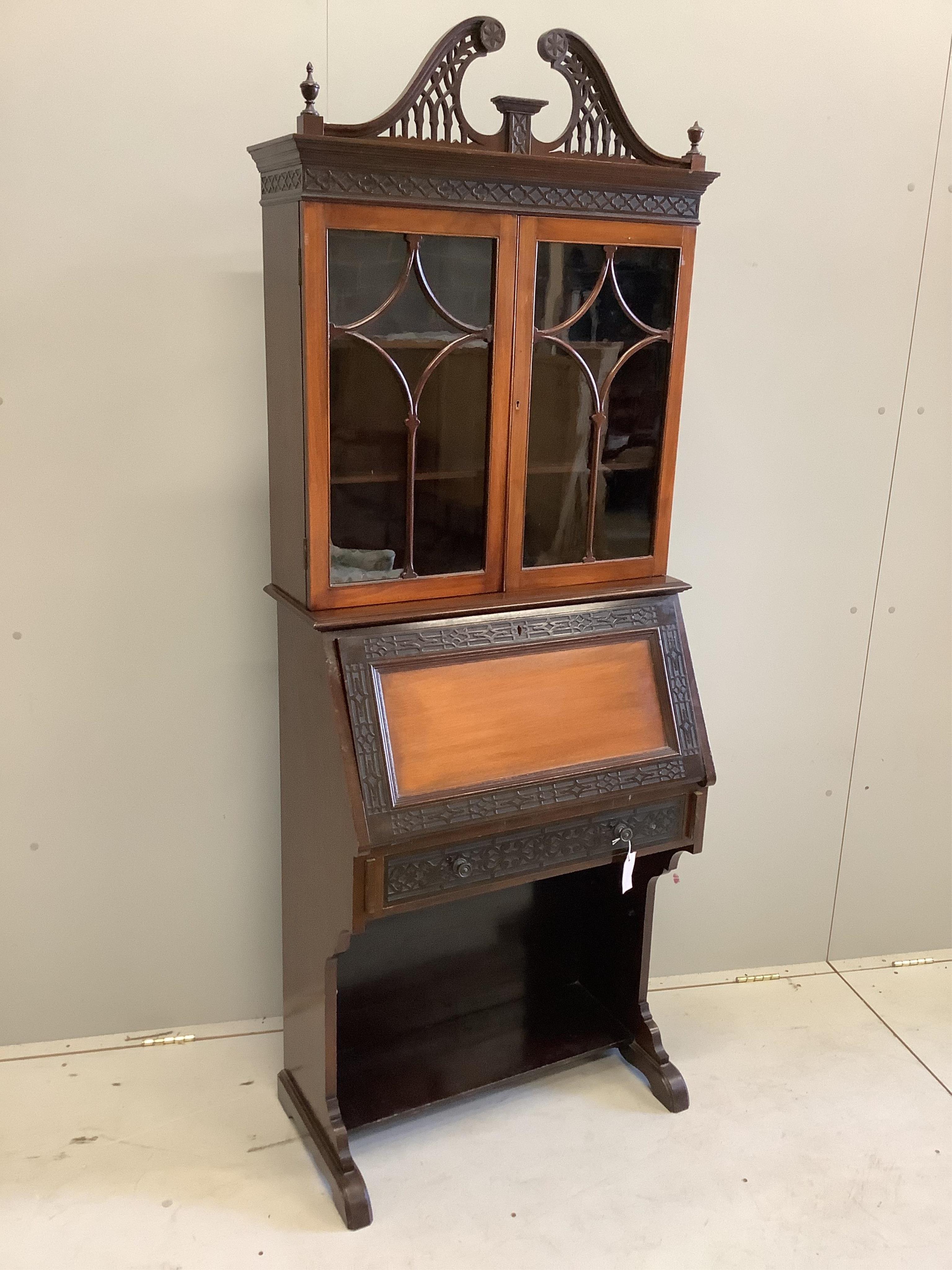 An Edwardian mahogany blind fret bureau cabinet, width 74cm, depth 38cm, height 194cm. Condition - fair                                                                                                                     