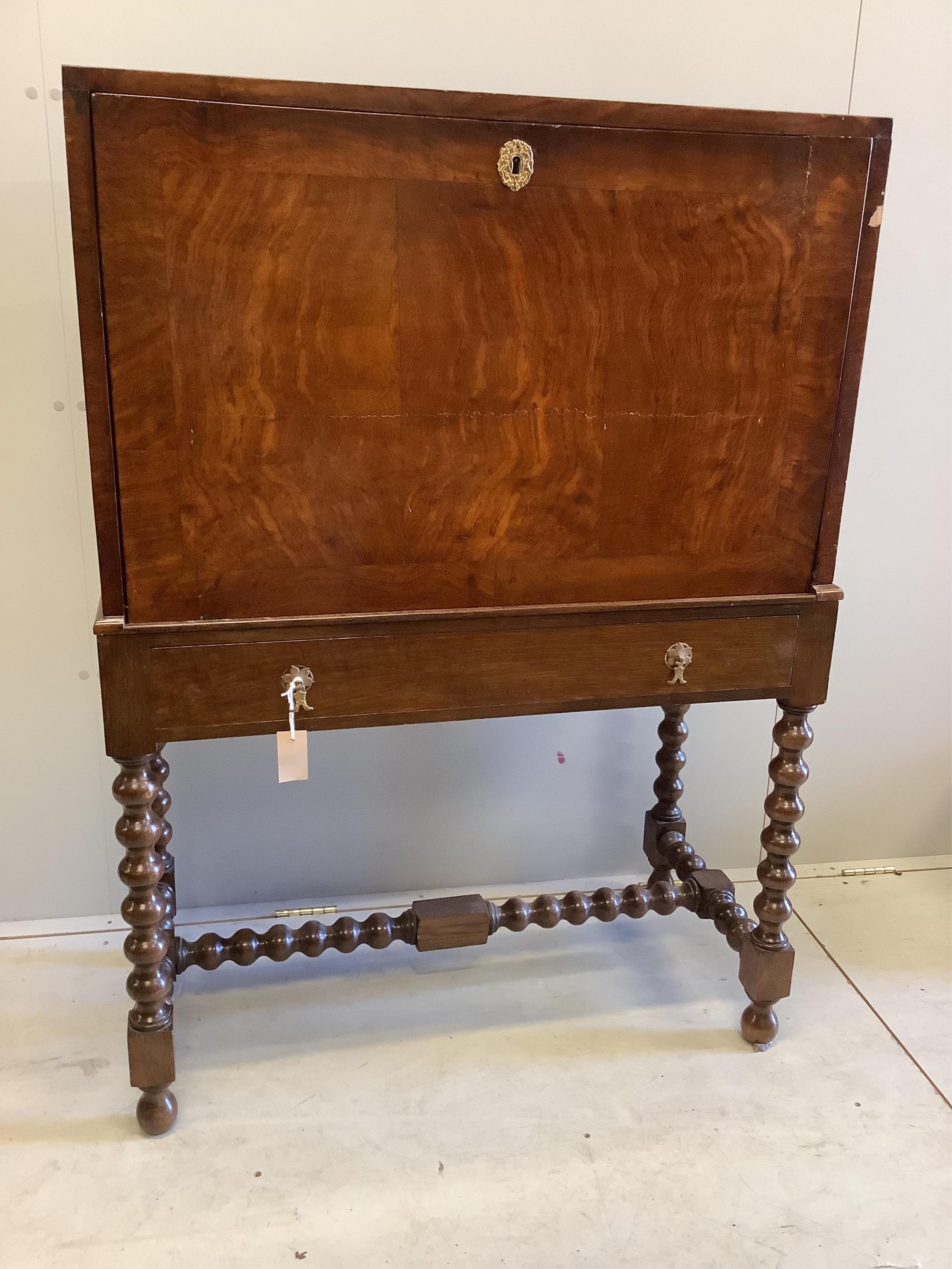 An 18th century walnut secretaire cabinet on later stand, width 91cm, depth 44cm, height 130cm. Condition - fair                                                                                                            