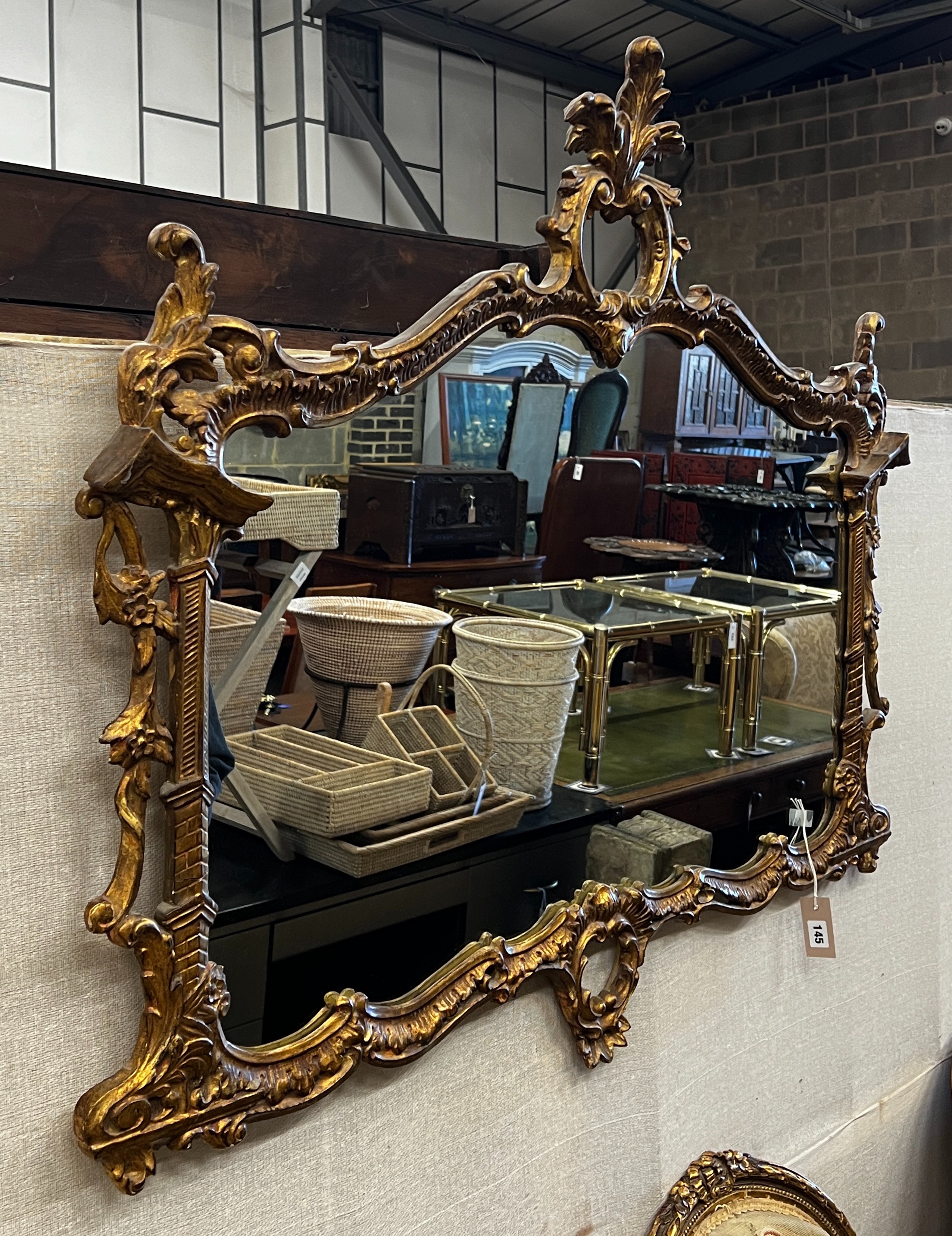 A Chinese Chippendale style giltwood framed and composition rectangular wall mirror, width 116cm, height 99cm                                                                                                               
