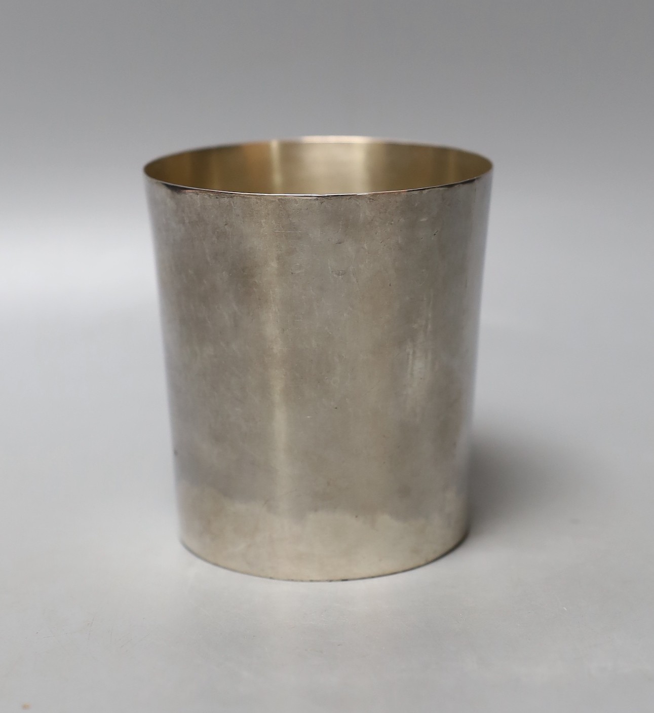A George III silver pint beaker, John Robins, London, 1780, 97mm, 164 grams(a.f.).                                                                                                                                          