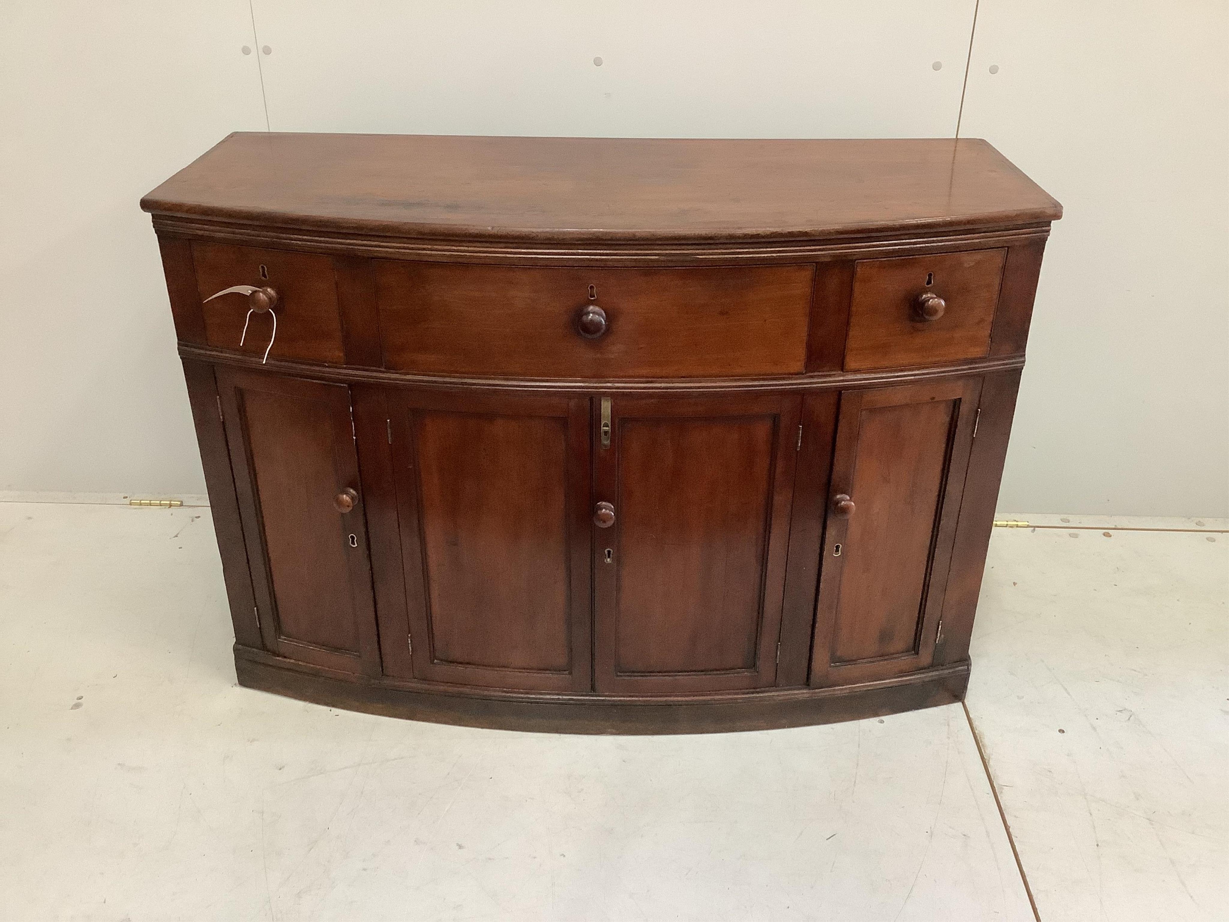 A Regency mahogany bowfront side cabinet, width 120cm, depth 49cm, height 83cm. Condition - fair                                                                                                                            