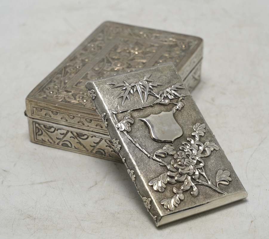 An early 20th century Chinese Export white metal card case by Wang Hing, 84mm, together with a Chinese white metal box with hinged cover. Condition - fair to good                                                          