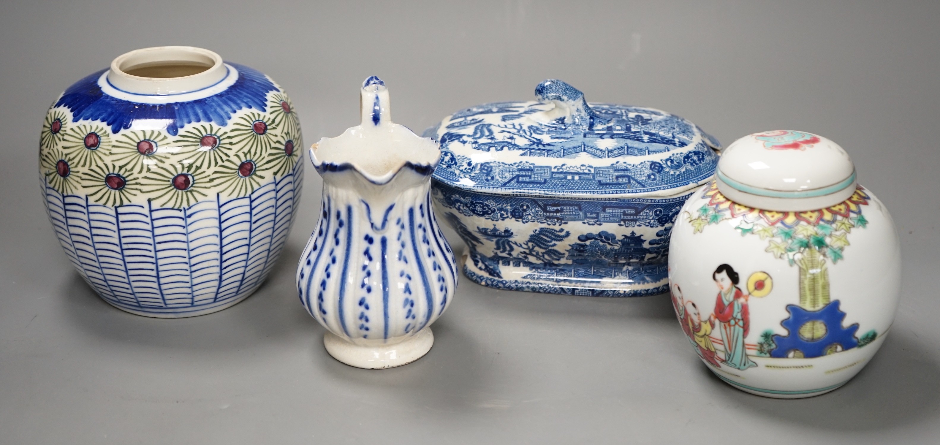 A Chinese famille rose jar and cover, another jar and two English pottery pieces                                                                                                                                            