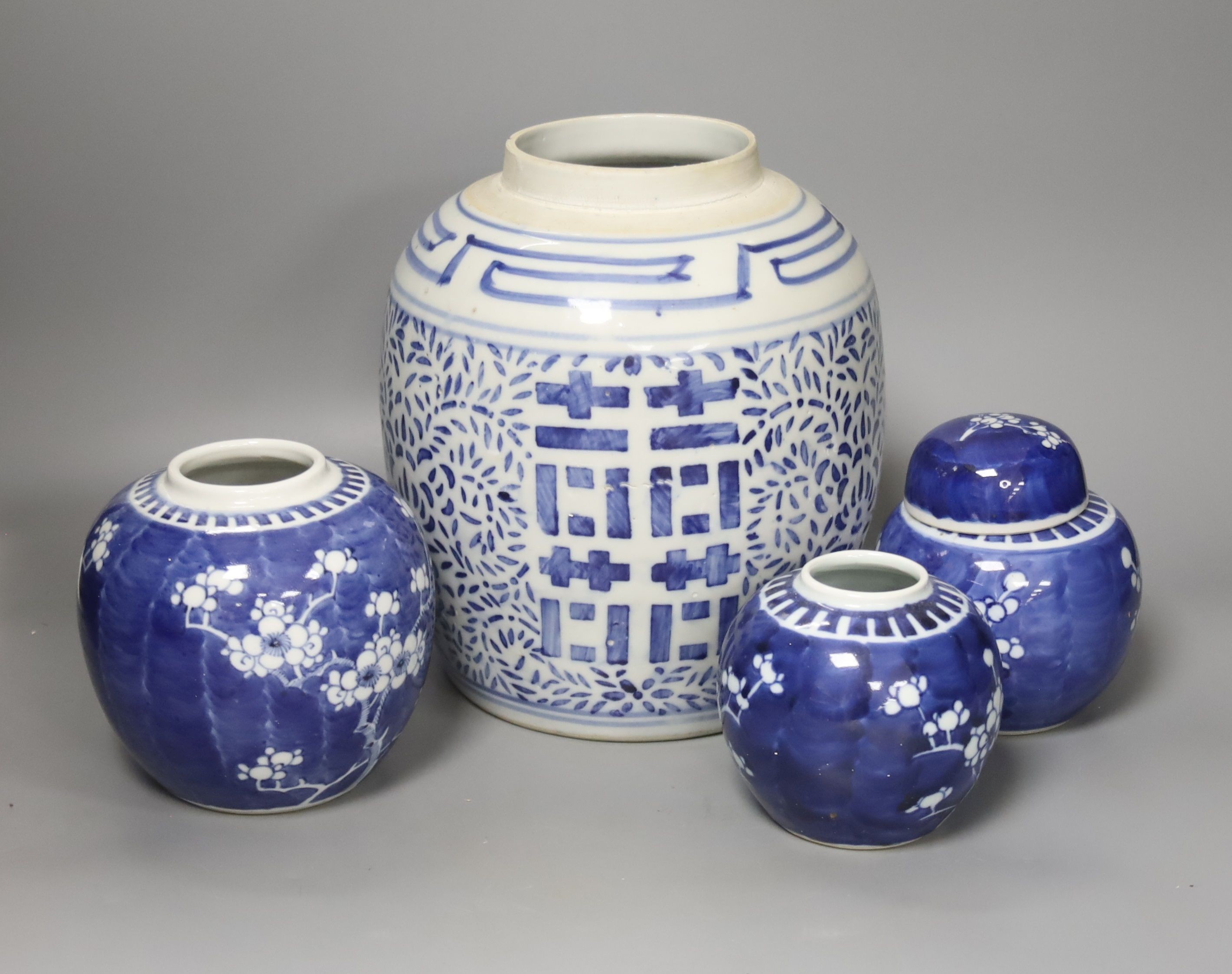 Four Chinese blue and white ginger jars, one with cover, tallest 23cm                                                                                                                                                       