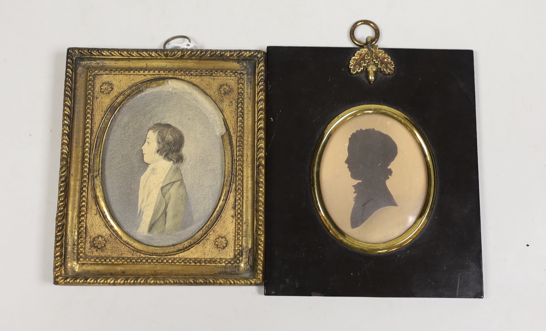 A pencil and wash portrait miniature of Lt Col William Somerset Dolben (1780-1817), indistinctly inscribed on reverse panel, together with an unknown silhouette portrait miniature, probably of a member of the Dolben fami