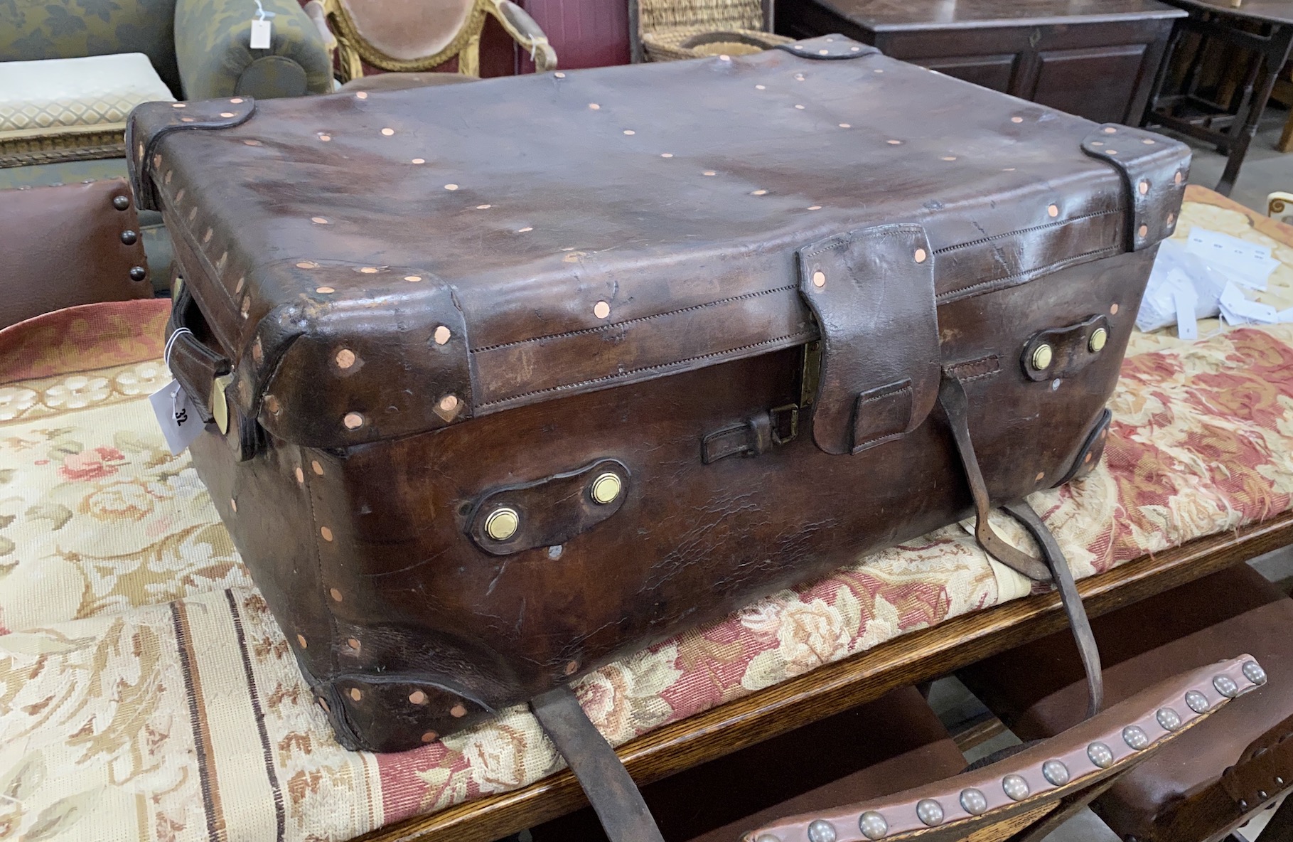 A Victorian leather brass and copper studded travelling trunk, width 89cm, depth 53cm, height 37cm                                                                                                                          