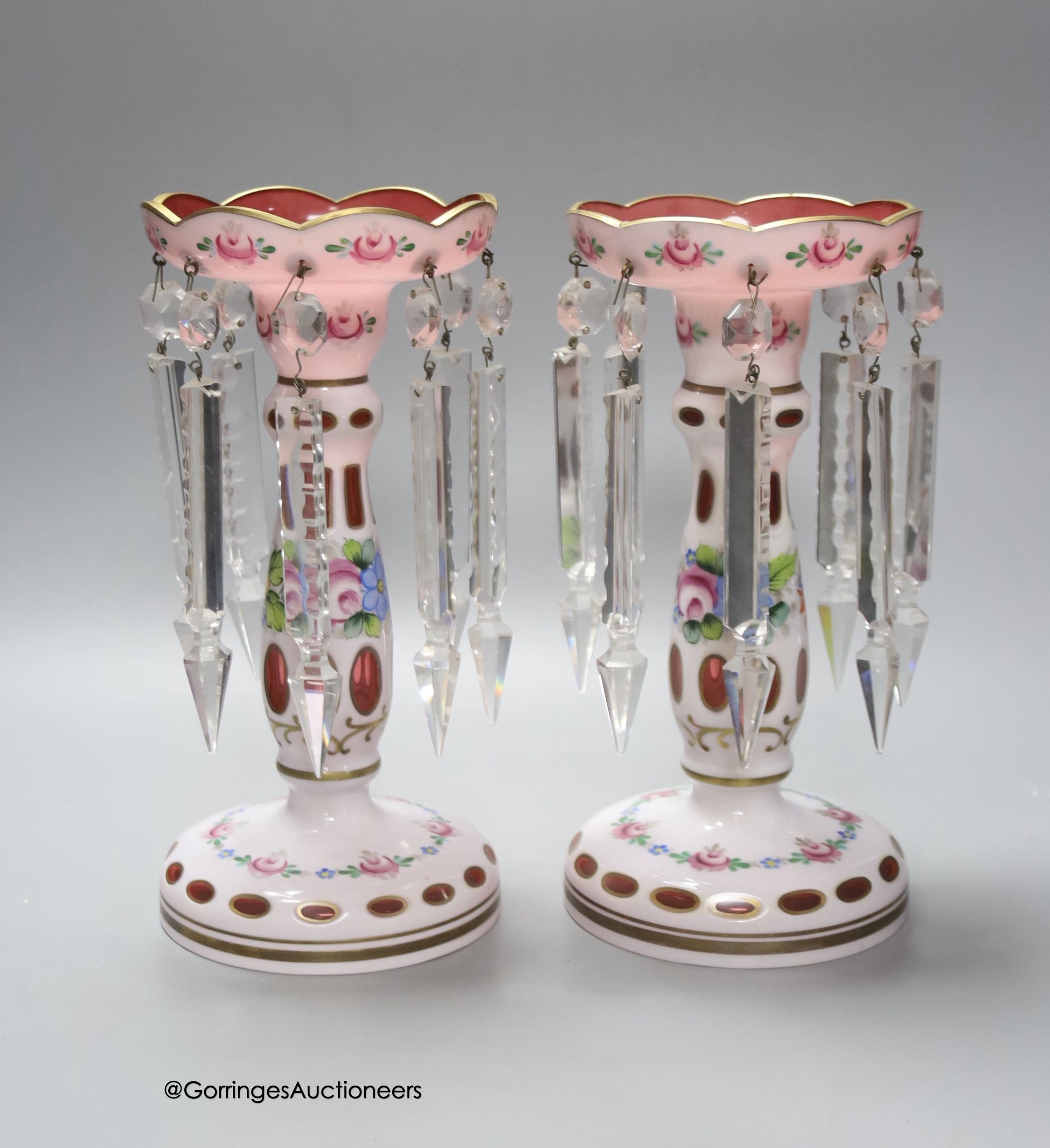 A pair of 19th century Bohemian overlay glass lustres decorated with flowers, height 25cm                                                                                                                                   