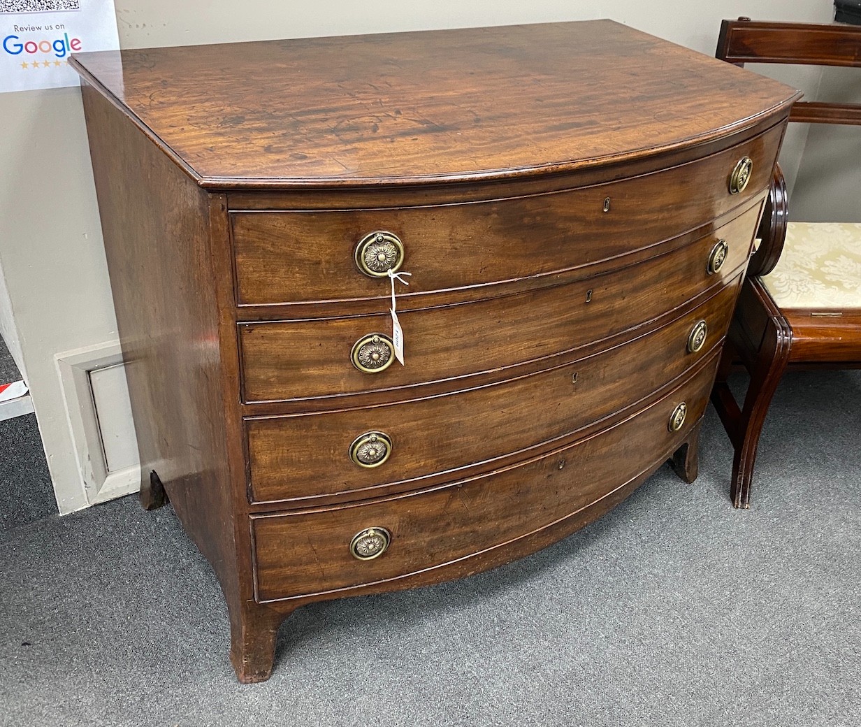 A George III mahogany bowfront dressing chest, with fitted interior, width 106cm, depth 61cm, height 85cm                                                                                                                   