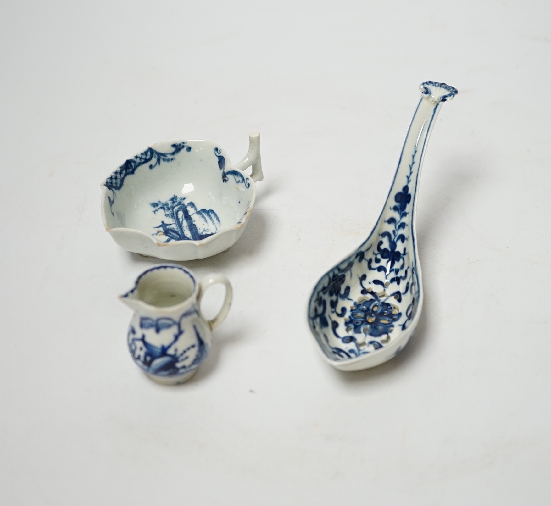 An 18th century Worcester spoon, a pickle dish and a miniature jug                                                                                                                                                          