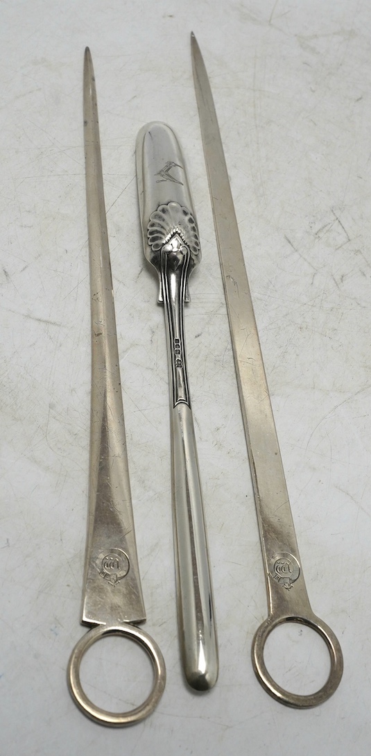 Two George III silver meat skewers by John Lias, London, 1800 and 1801, 29.9cm, together with an Edwardian silver marrow scoop. Condition - fair                                                                            
