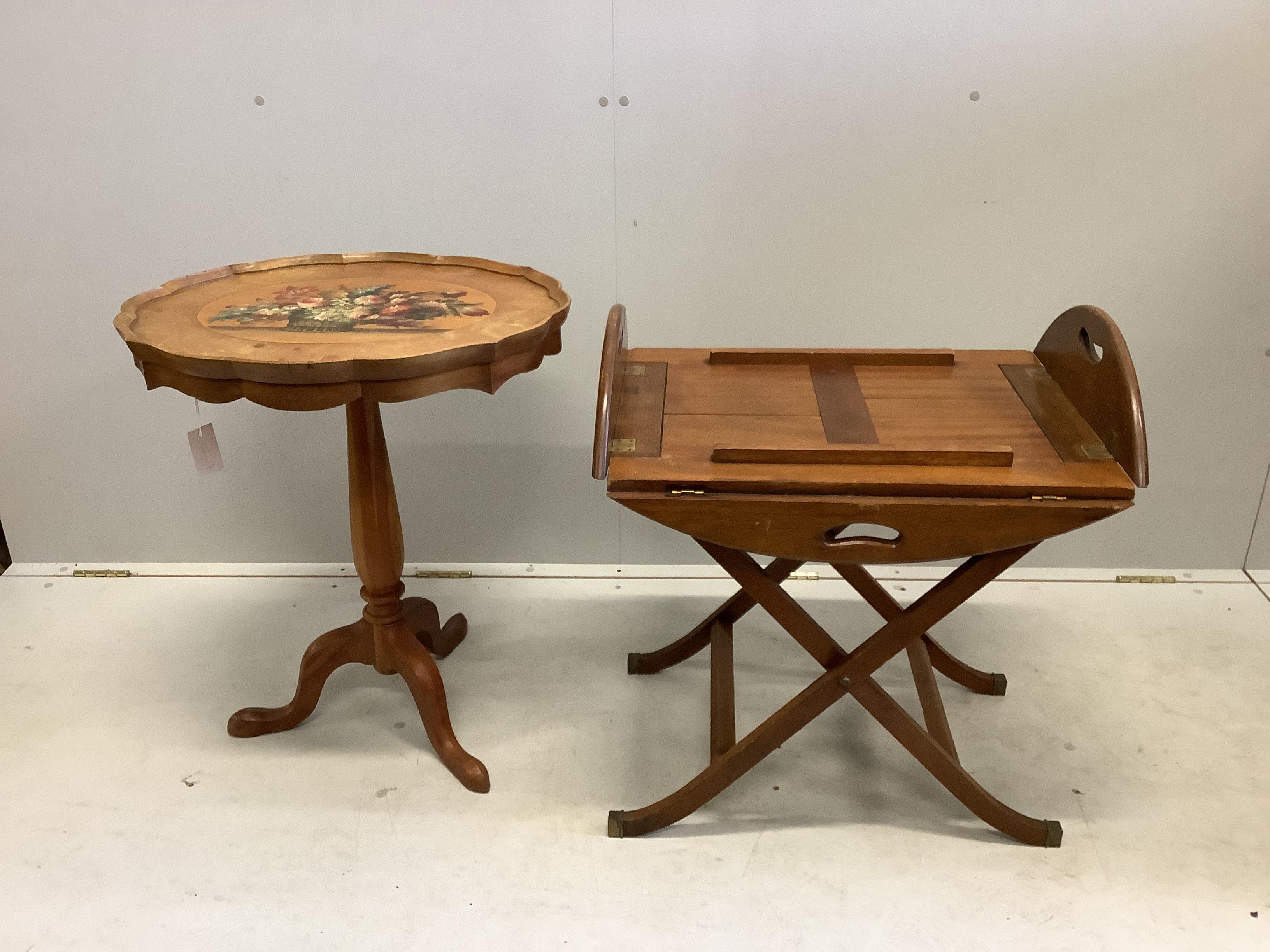 A Victorian style mahogany butler's tray on stand, width 64cm, depth 48cm, height 71cm together with a painted oval tripod wine table                                                                                       
