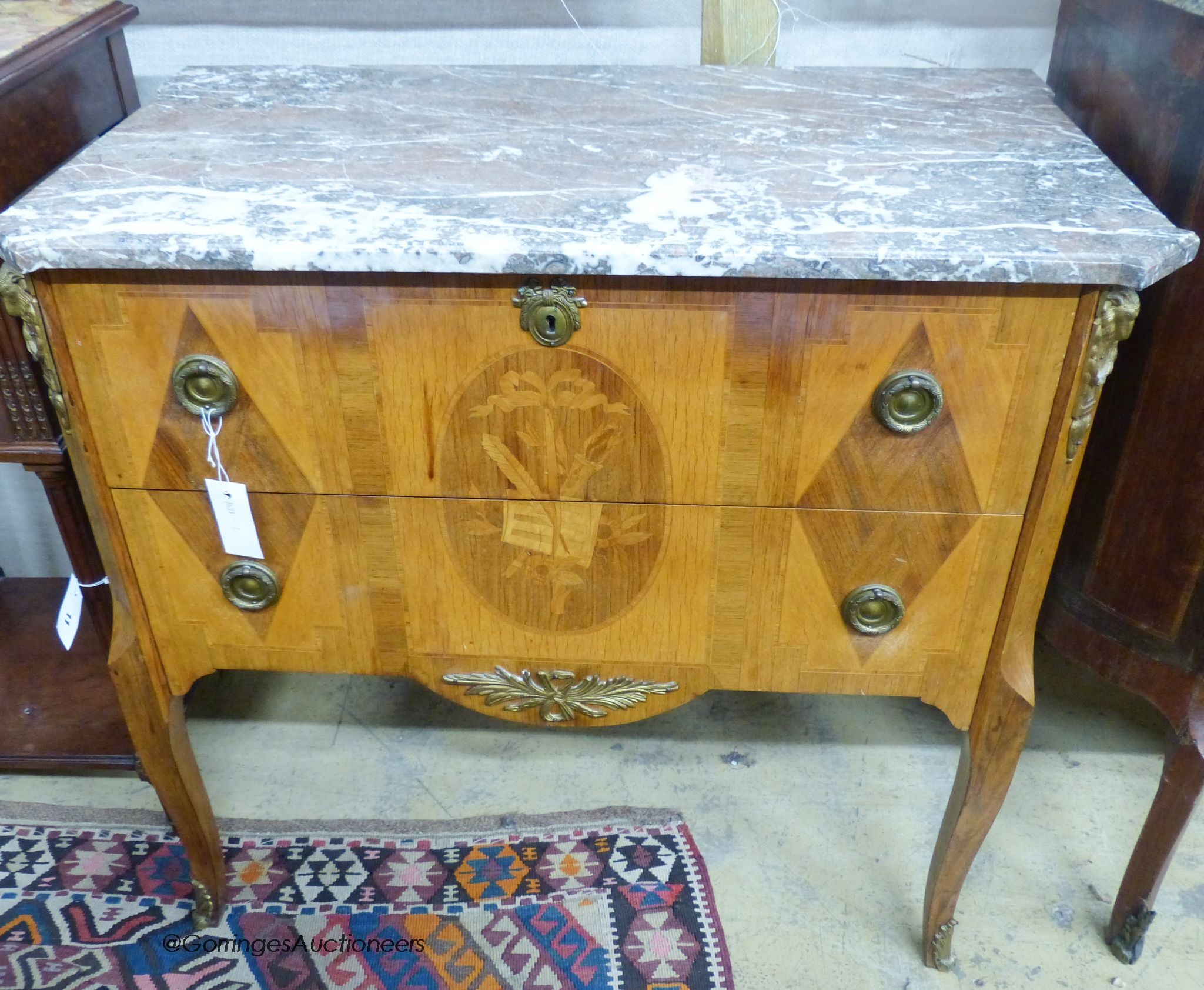 A French Louis XVI style marquetry inlaid marble topped commode, width 84cm, depth 47cm, height 78cm                                                                                                                        