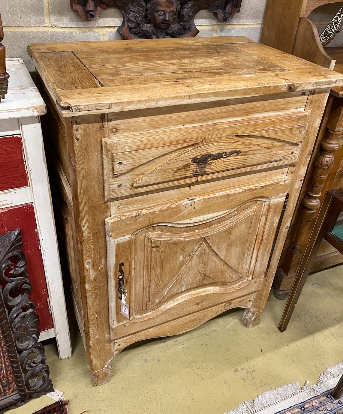 A 19th century French pine side cabinet, width 82cm, depth 53cm, height 113cm                                                                                                                                               