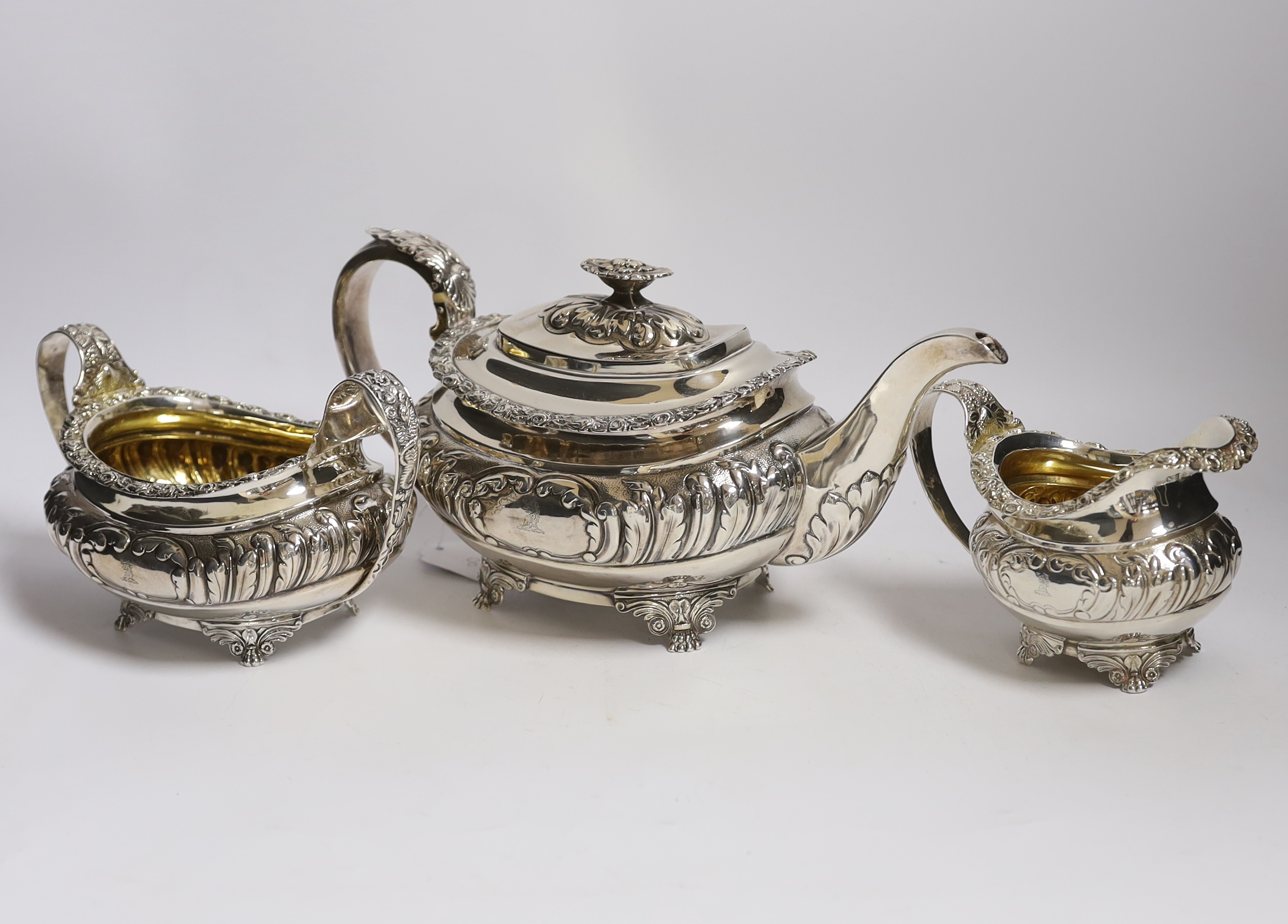 A George IV silver three piece oval tea set, on winged paw feet, by Naphtali Hart, London 1820, gross weight 39.4oz. CITES Submission reference WPRX4YEC                                                                    