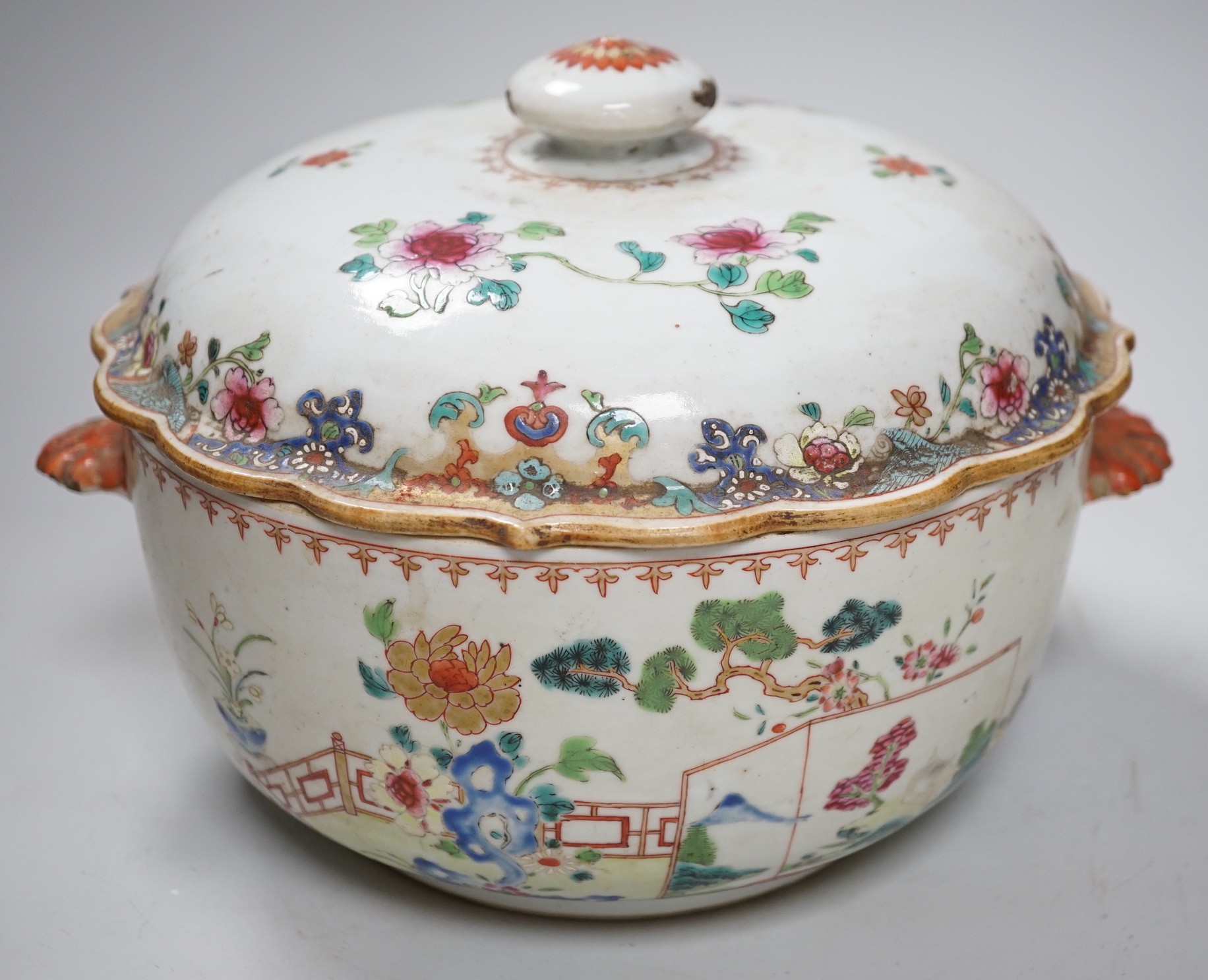 A Chinese famille rose ‘garden’ tureen and cover, Qianlong period, 19cms high                                                                                                                                               