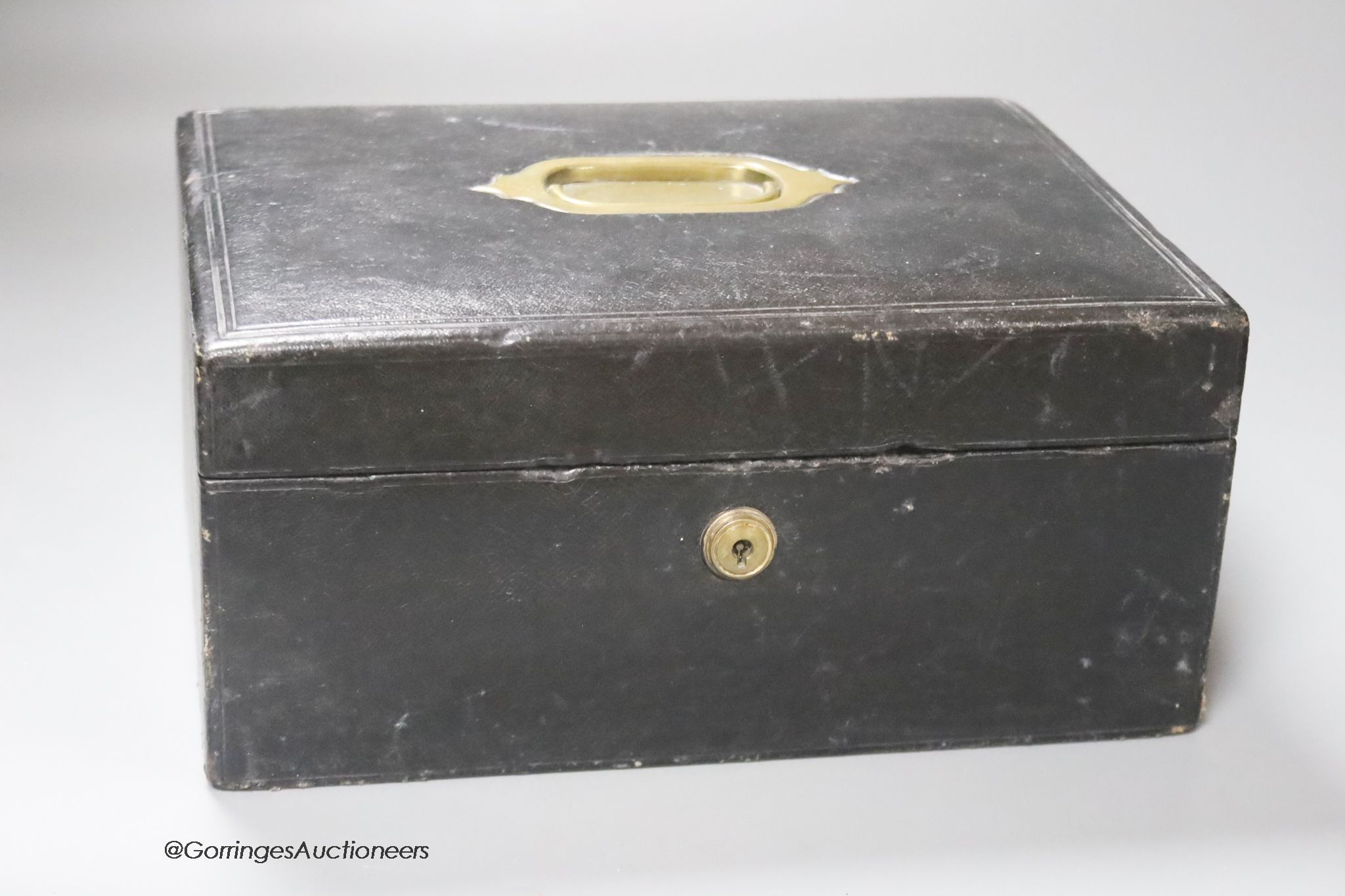 A Victorian leather bound writing box, length 27cm                                                                                                                                                                          