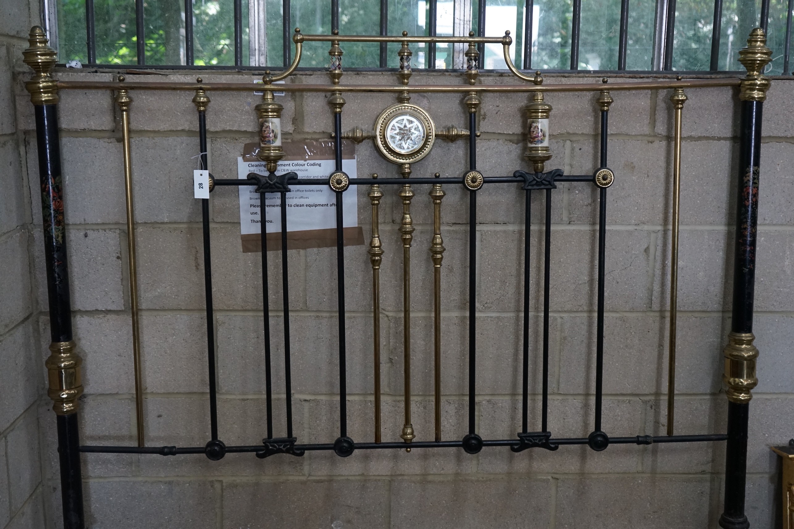 A Victorian style wrought iron headboard, width 180cm, height 163cm                                                                                                                                                         