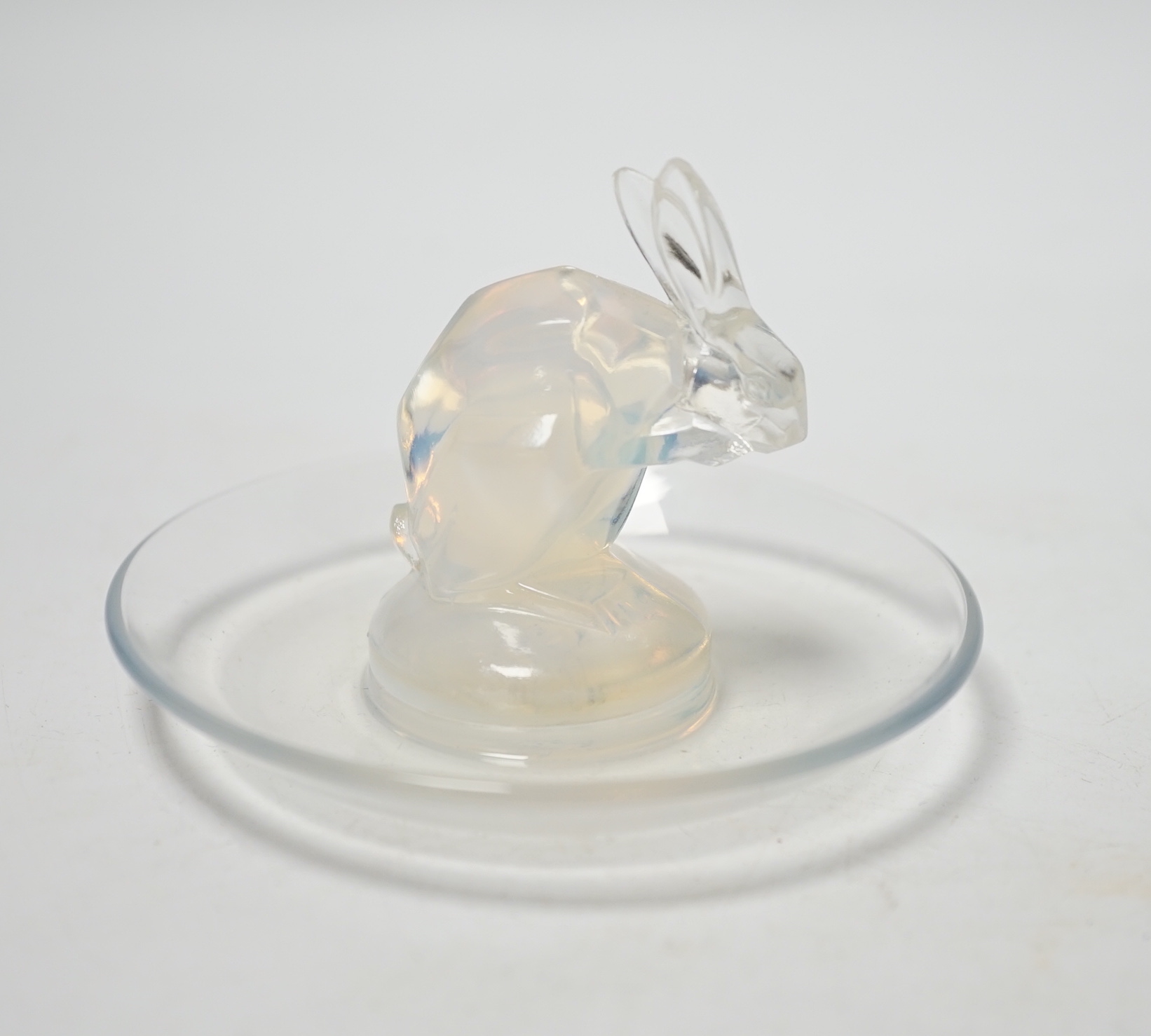 A Lalique moulded glass ‘rabbit’ pin dish, 9.5cm diameter                                                                                                                                                                   