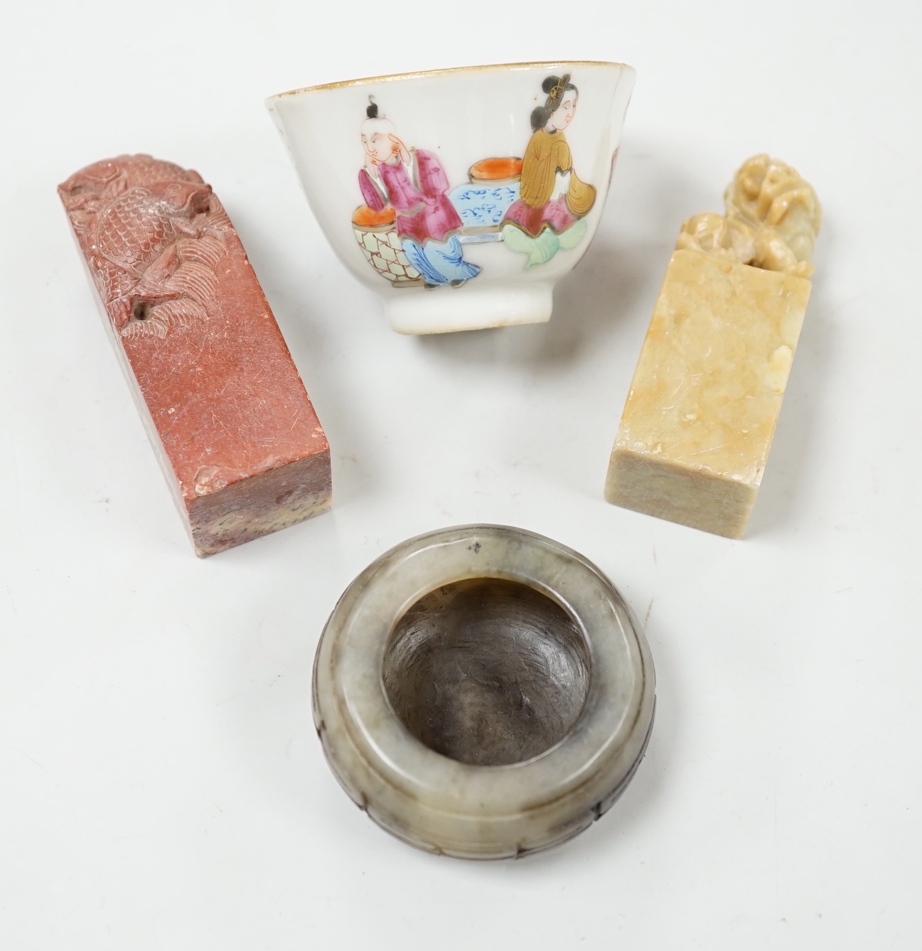 Two Chinese soapstone seals, a jade bowl, and a tea bowl, tea bowl 6.5cm diameter                                                                                                                                           