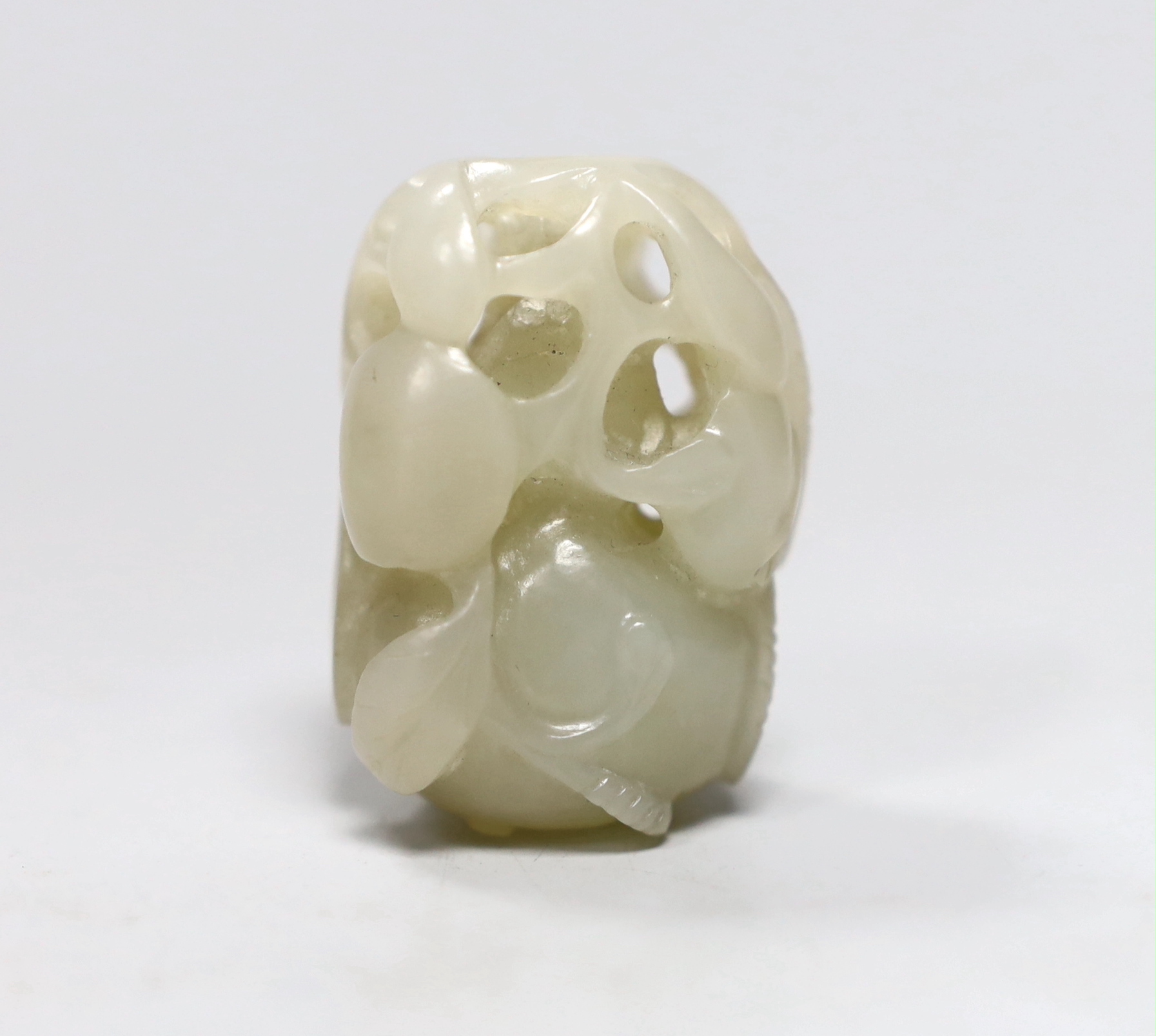 A Chinese pale celadon jade carving of a gourd, 4.4cm                                                                                                                                                                       