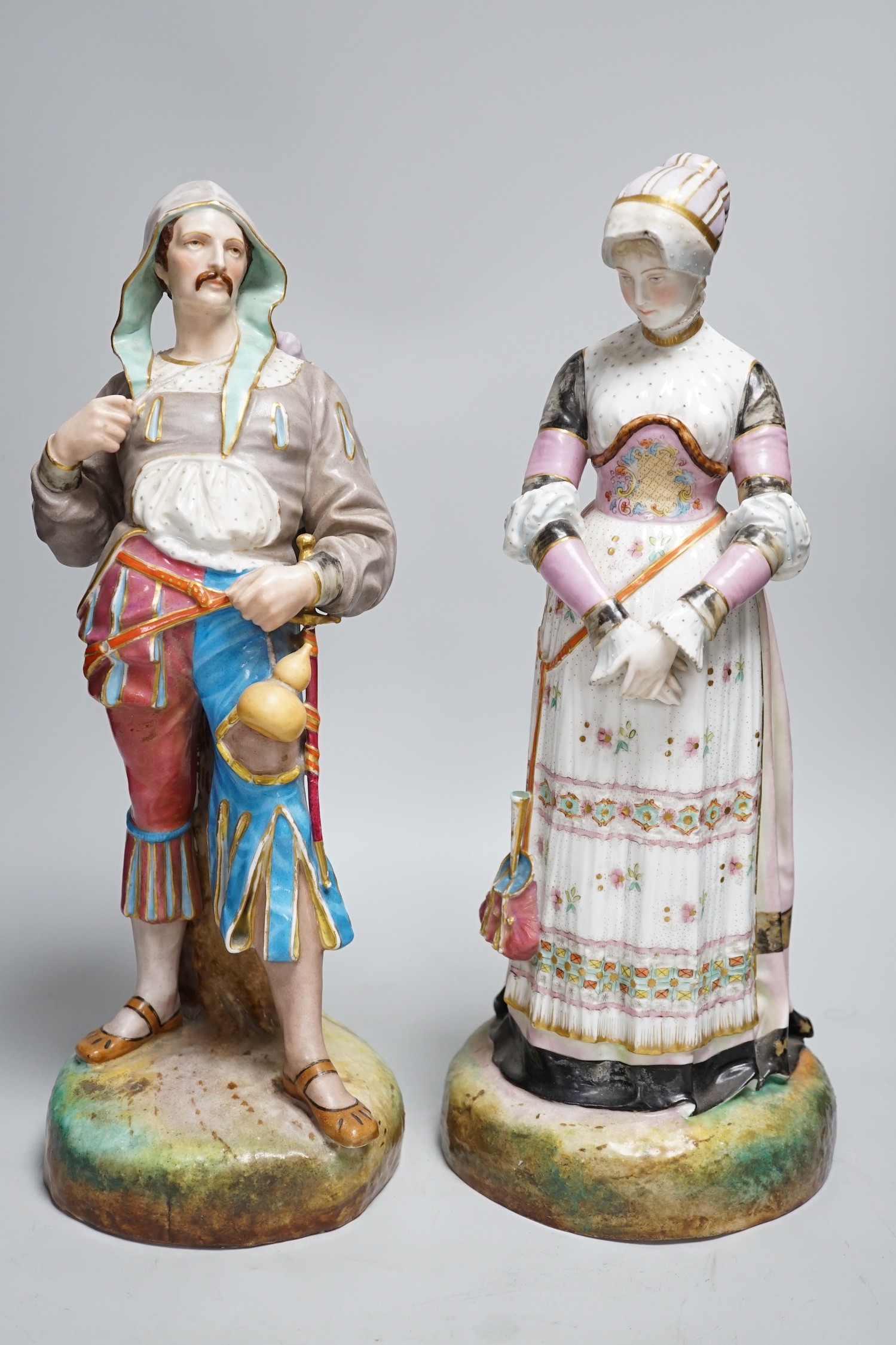 A pair of large Paris porcelain figures of a gentleman and a lady, lady 41cms high                                                                                                                                          