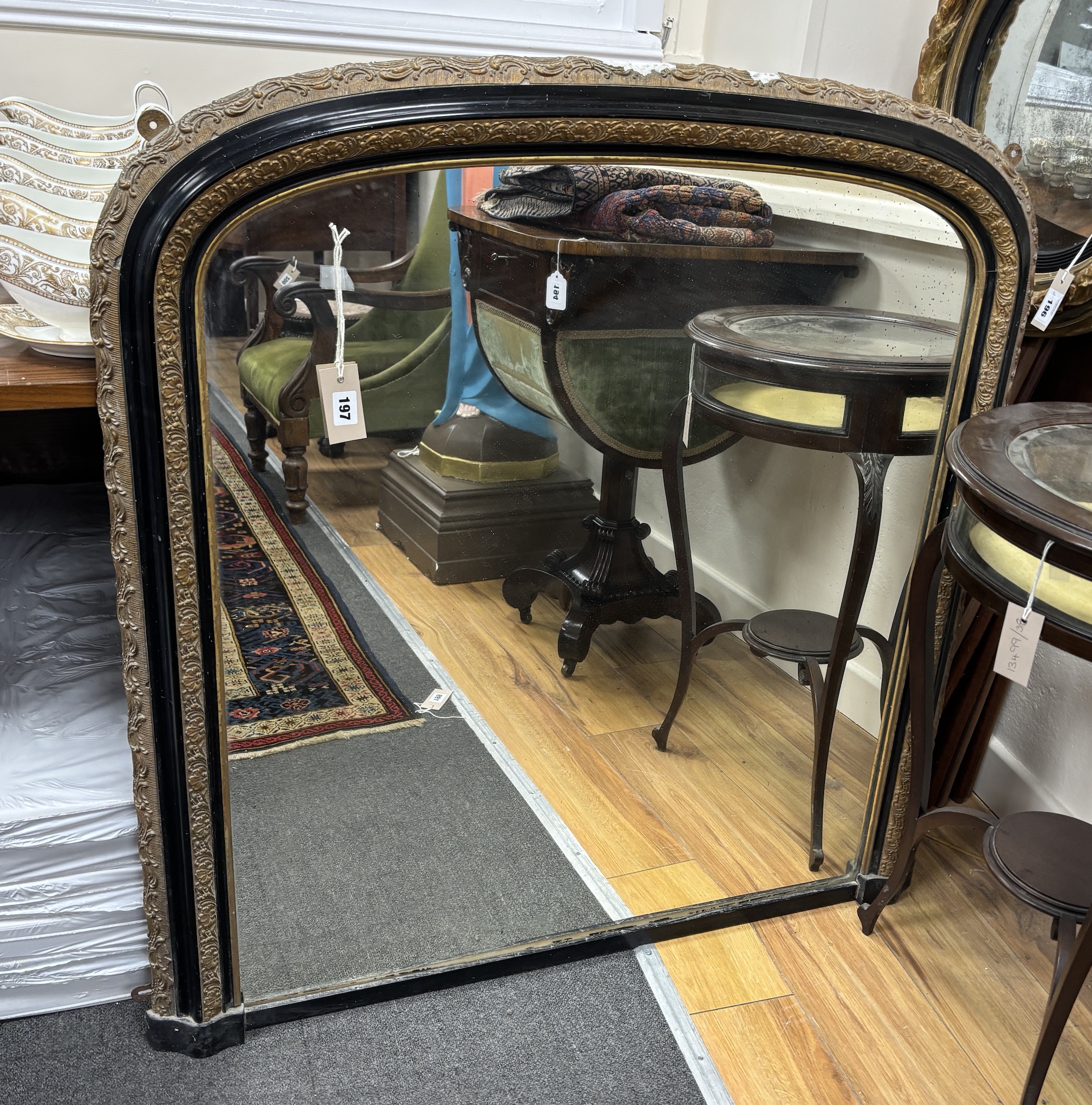 A Victorian ebonised and gilt composition overmantel mirror, width 94cm, height 102cm                                                                                                                                       