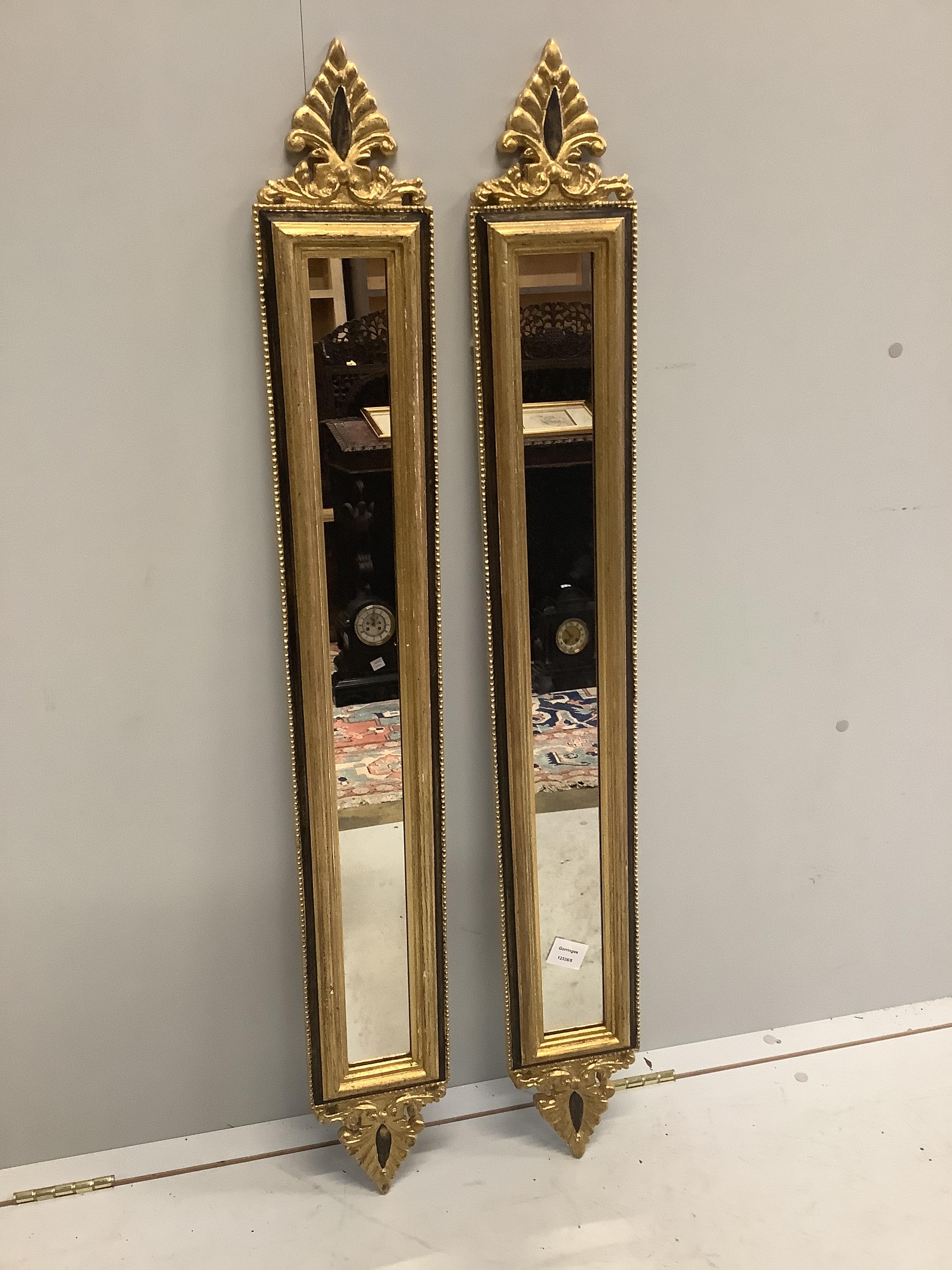 A pair of narrow Regency style wall mirrors, width 16cm, height 118cm                                                                                                                                                       