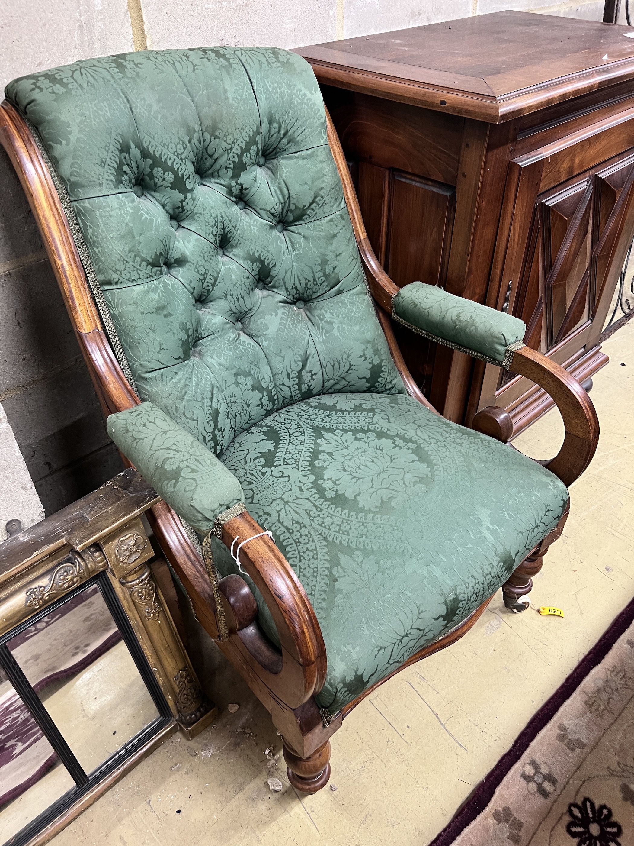 A Victorian mahogany upholstered open armchair, width 56cm, depth 81cm, height 96cm                                                                                                                                         