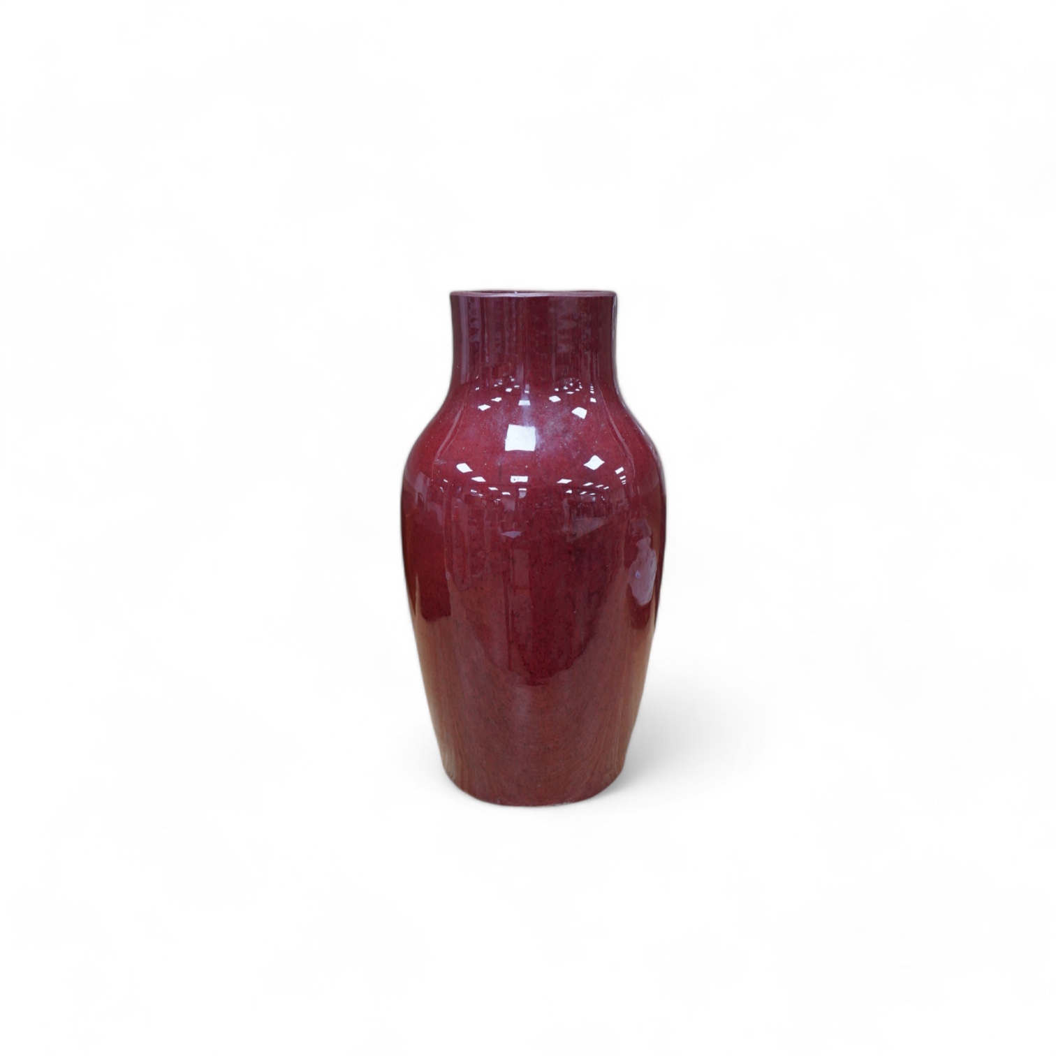 An 18th century Chinese sang de boeuf glazed vase, 34cm. Condition - ground down                                                                                                                                            