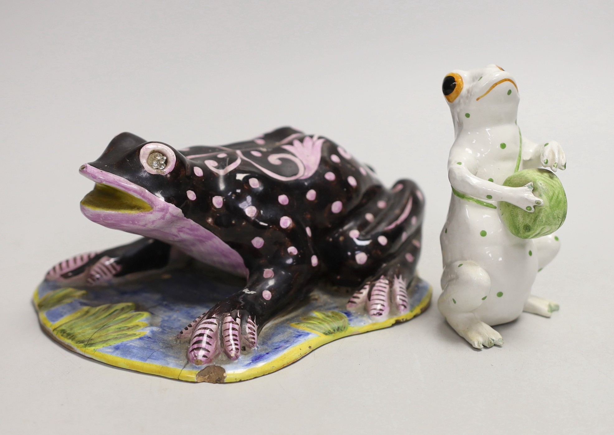 A Masonic faience model of a frog and another, largest 19cm long                                                                                                                                                            
