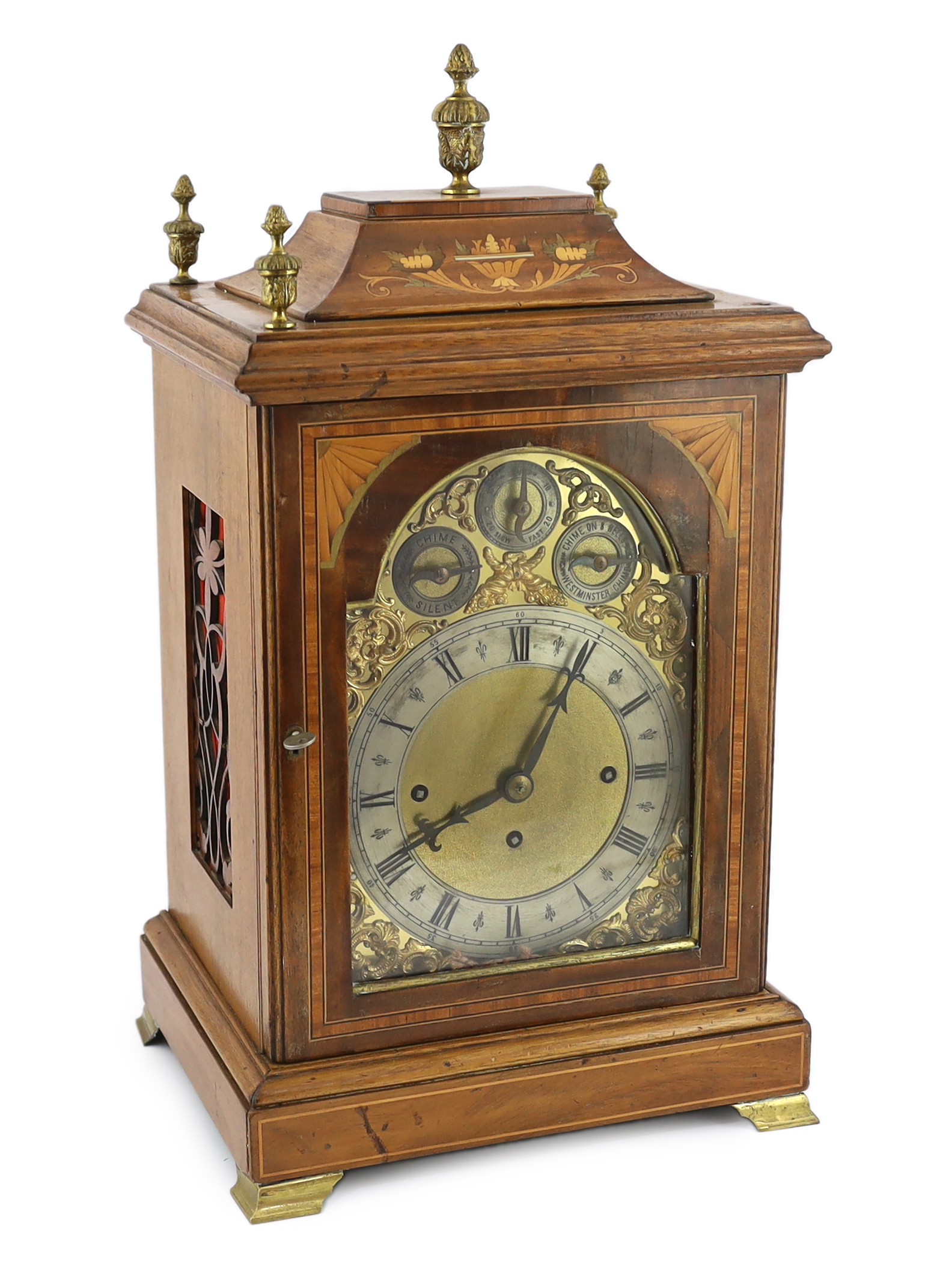 An Edwardian marquetry inlaid mahogany eight day chiming bracket clock 32cm wide, 27cm deep, 55cm high                                                                                                                      
