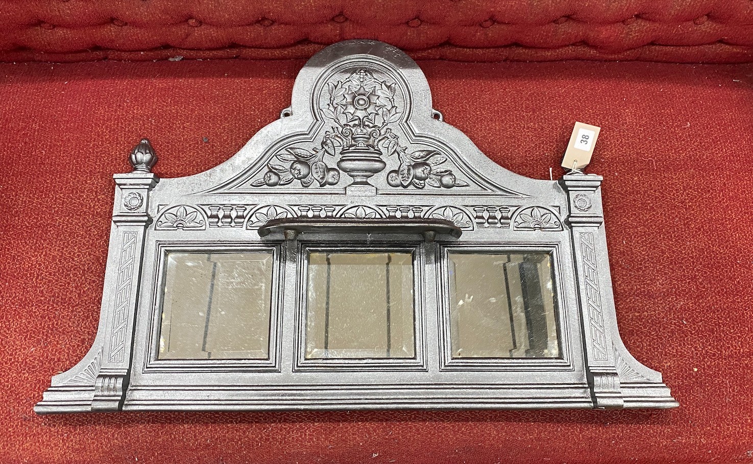 A small Victorian cast iron overmantel mirror, width 82cm, height 54cm                                                                                                                                                      