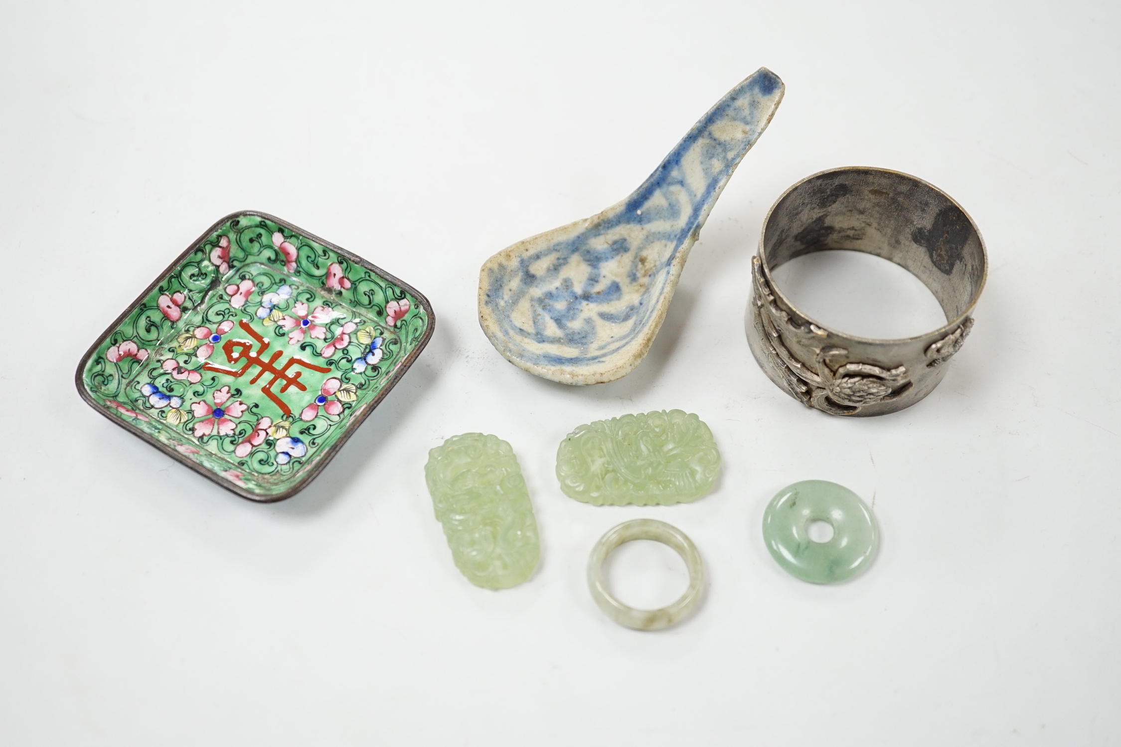 Four Chinese jade items, a pottery spoon, napkin ring and enamel dish, dish 6.5cm wide                                                                                                                                      