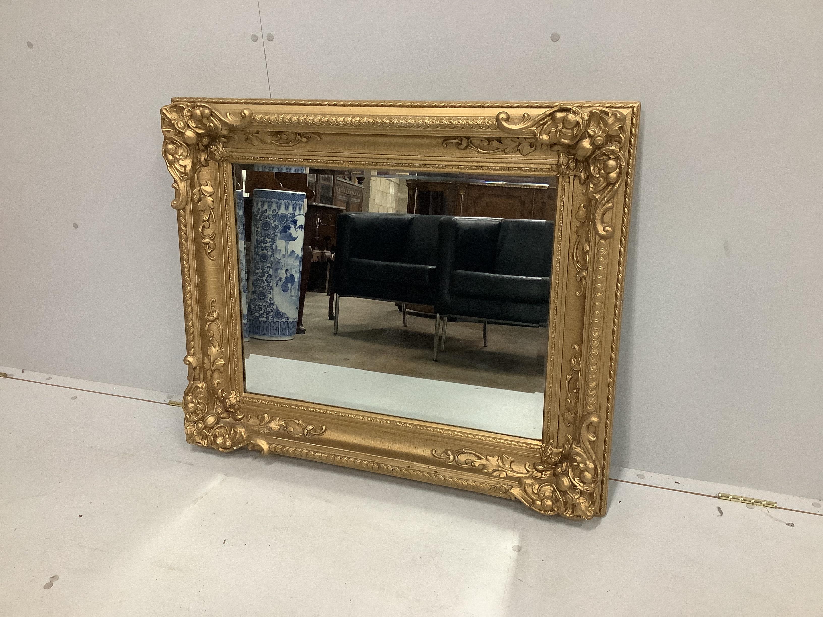 A Victorian style rectangular giltwood composition wall mirror (converted picture frame), width 97cm, height 81cm                                                                                                           