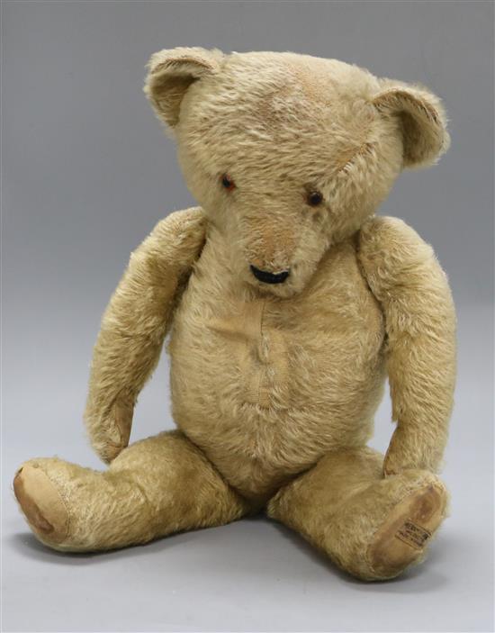 A 1930s Merrythought teddy bear Theo with pale blond mohair