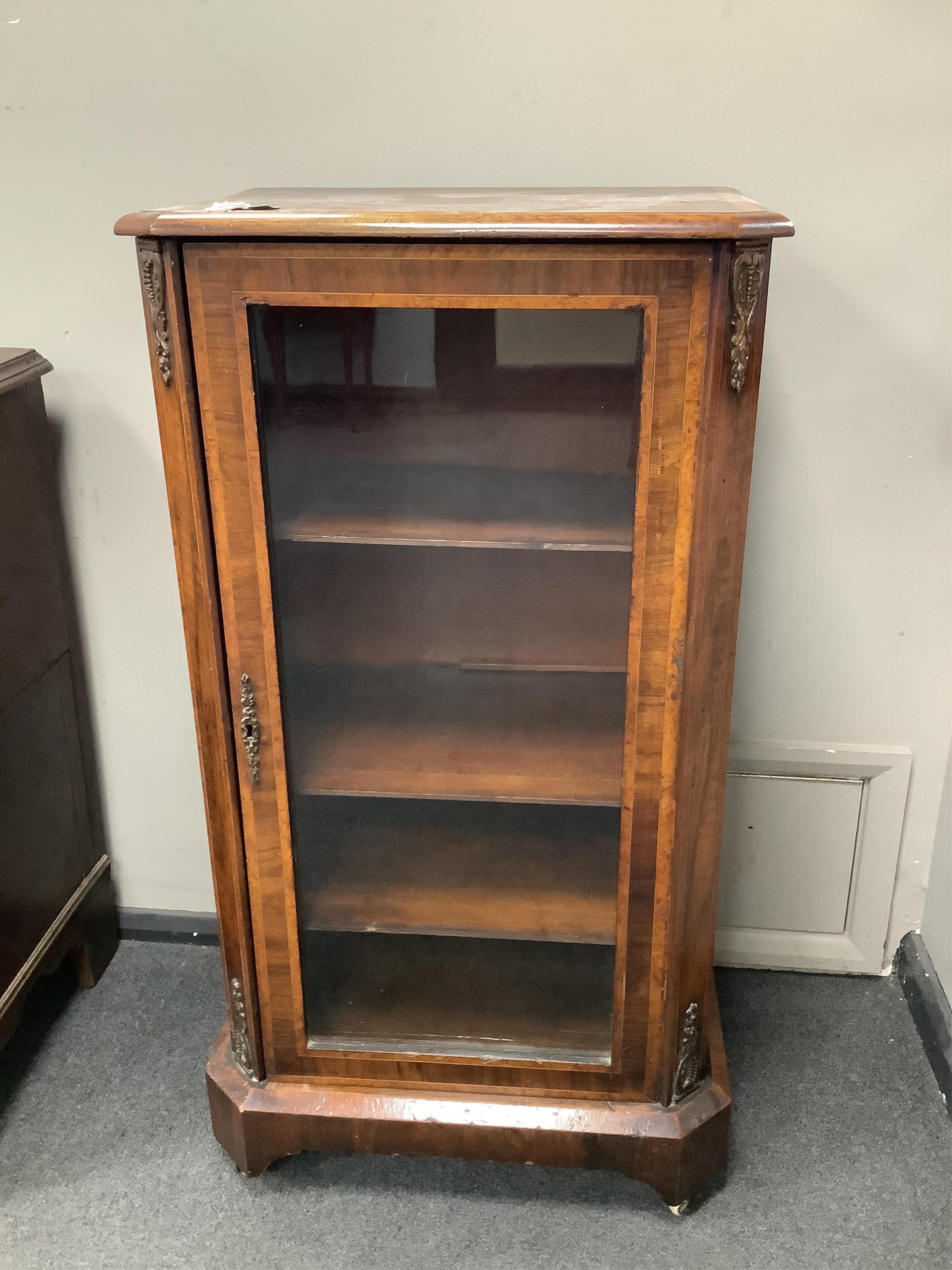 A Victorian banded, gilt metal mounted walnut music cabinet, width 54cm, depth 39cm, height 100cm. Condition - fair                                                                                                         