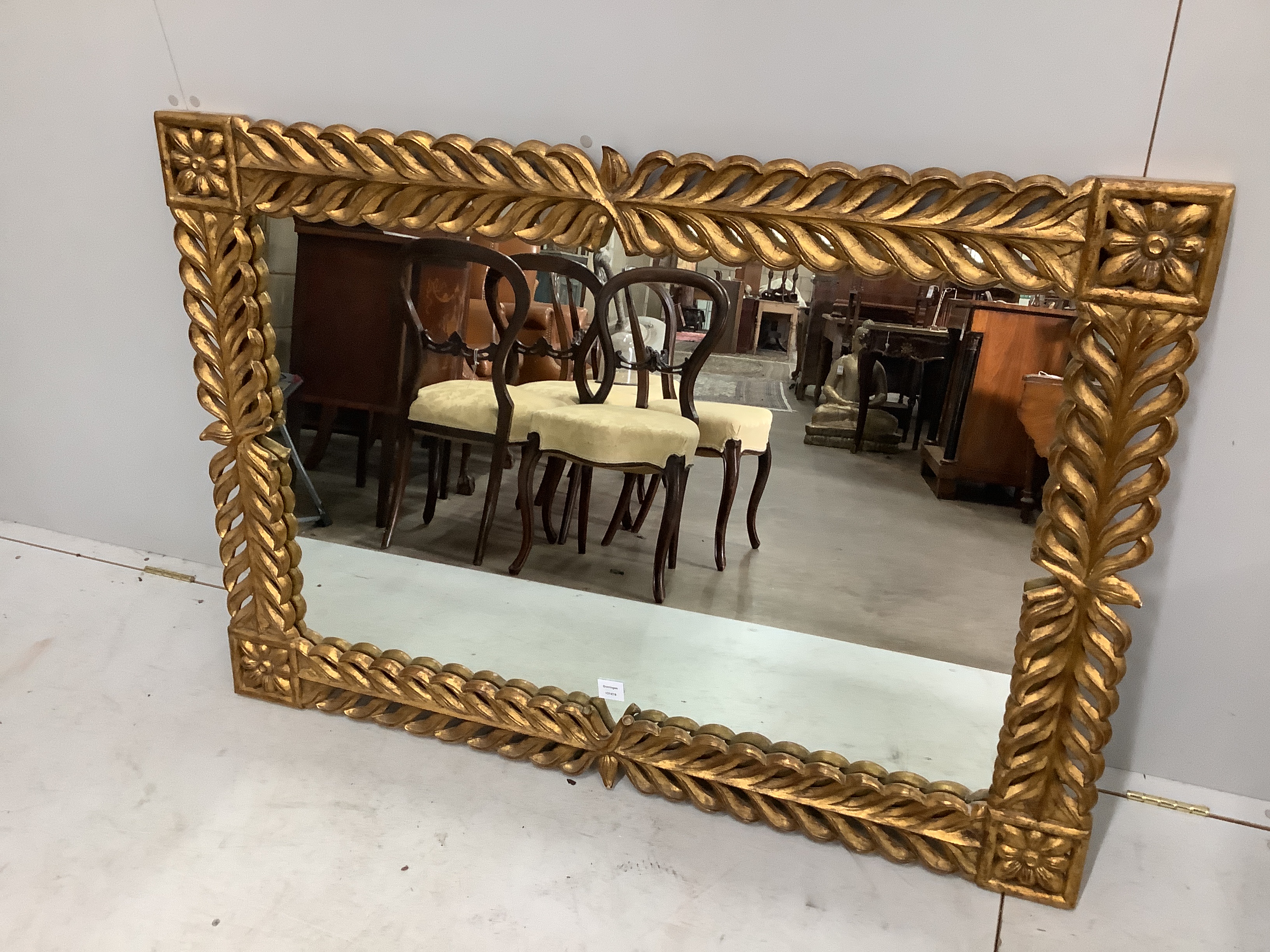 A Regency style rectangular gilt composition wall mirror, width 133cm, height 93cm                                                                                                                                          