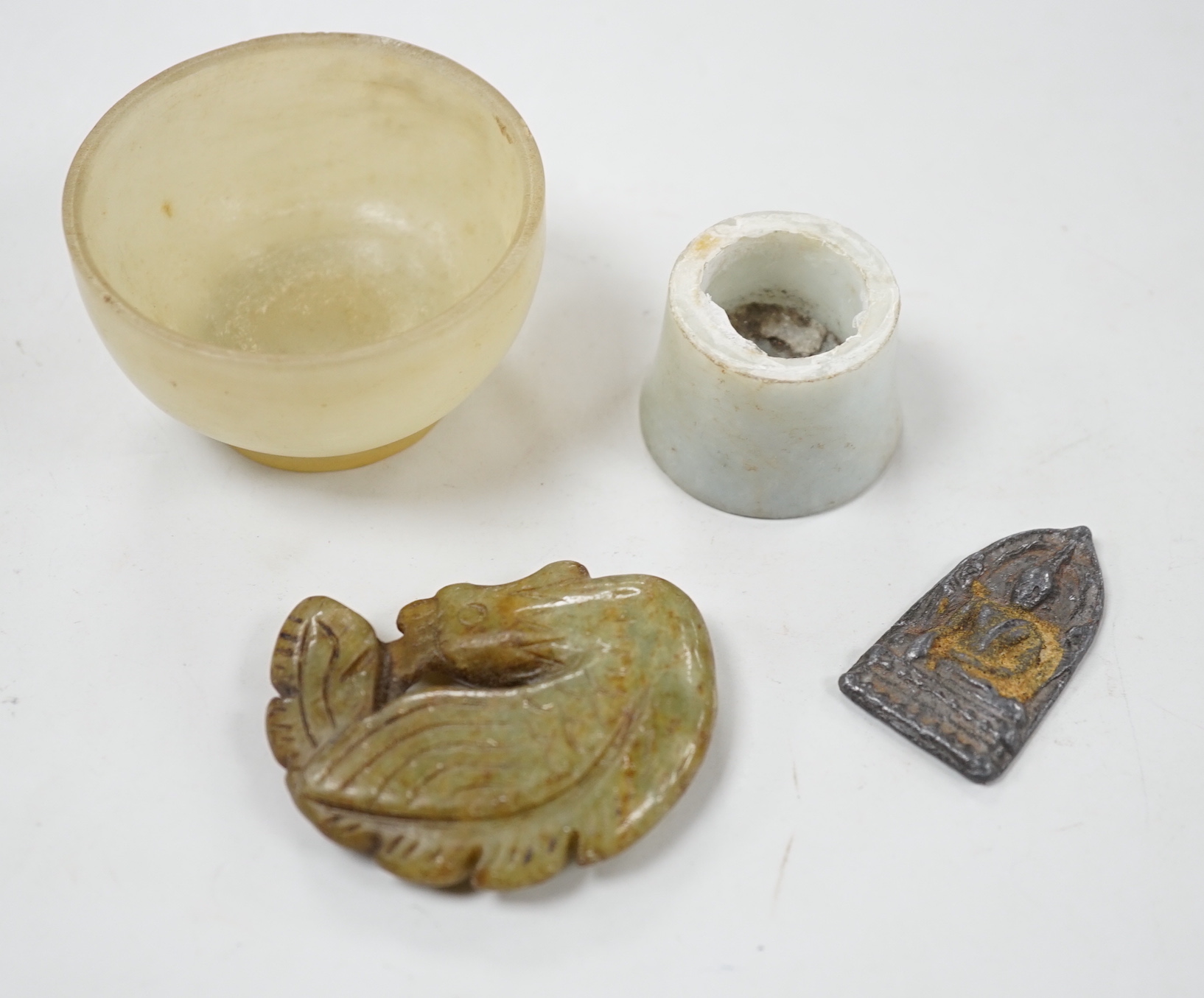 Three Chinese jades and a metal deity, bowl 6cm diameter                                                                                                                                                                    