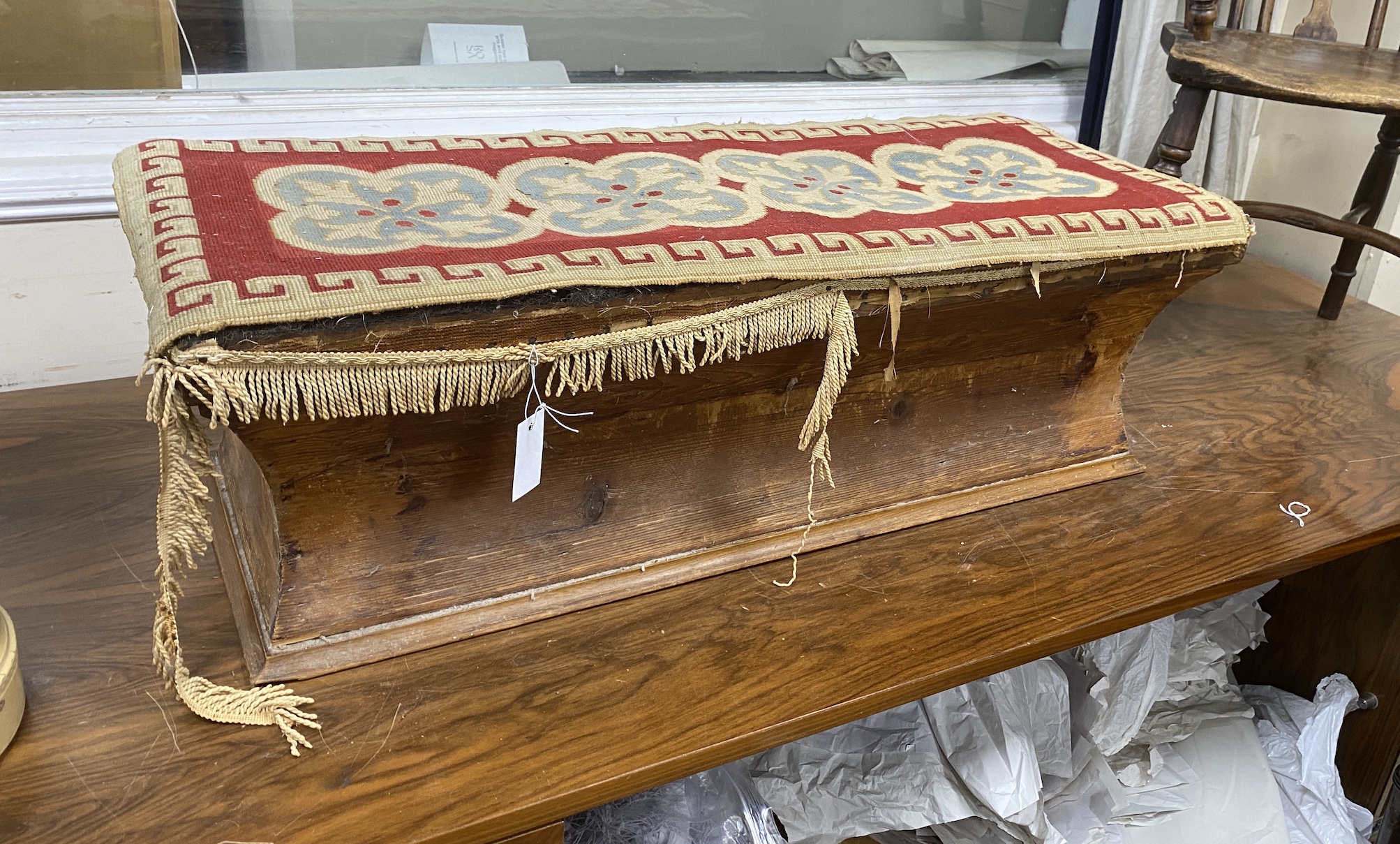 A Victorian pine concave sided ottoman, width 105cm, depth 44cm, height 32cm                                                                                                                                                