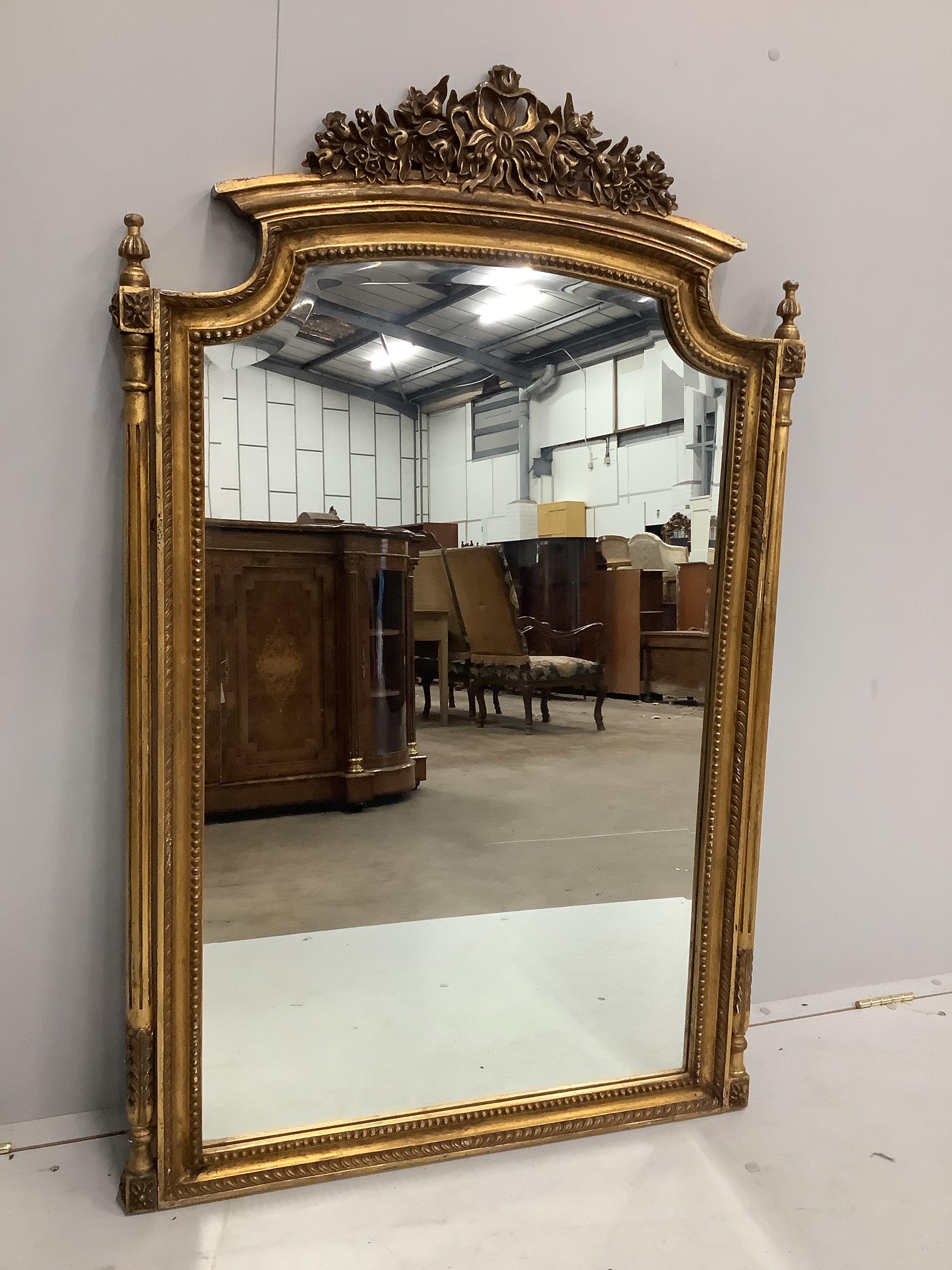 A Victorian style gilt composition wall mirror, width 82cm, height 130cm                                                                                                                                                    