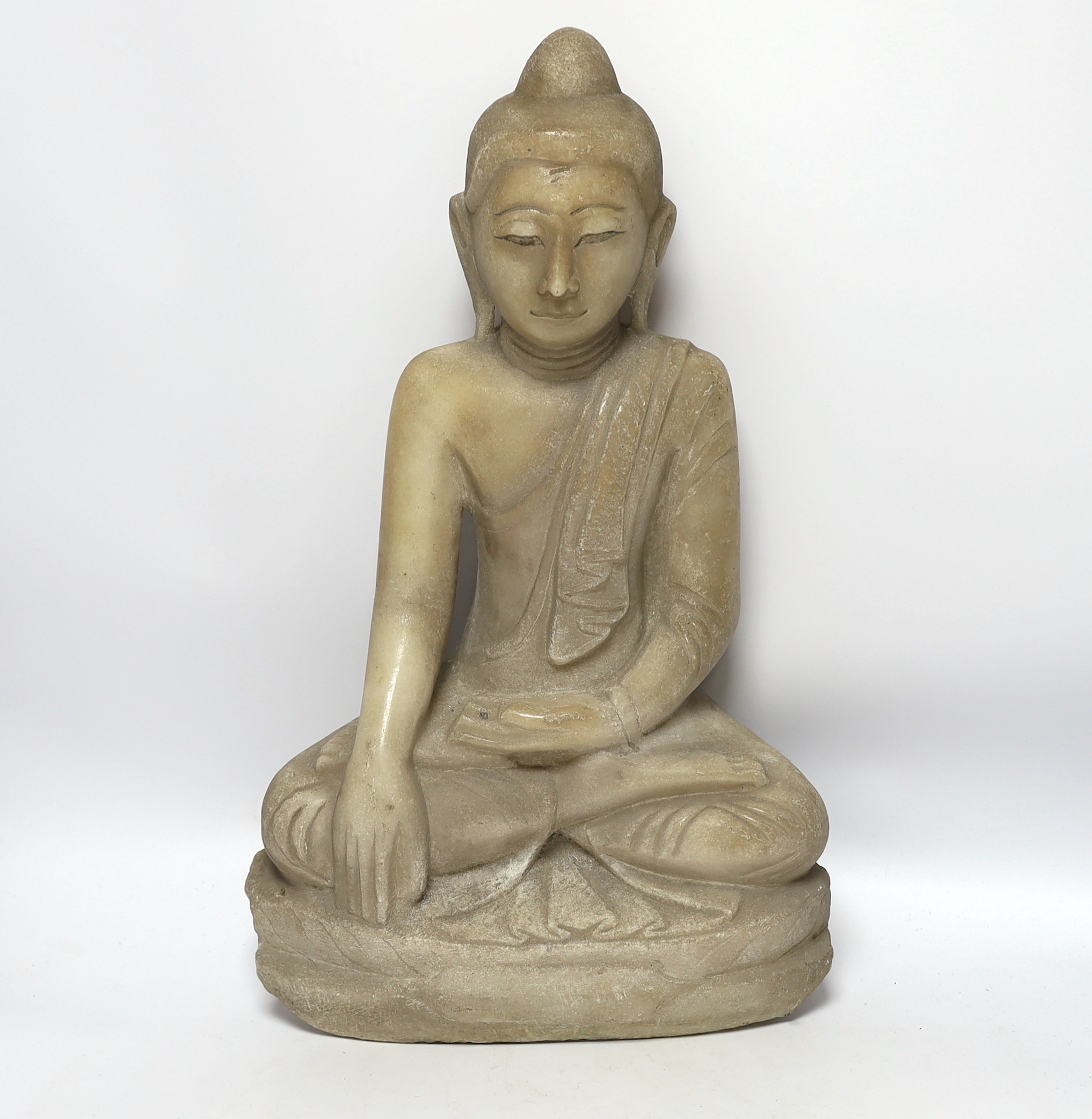 A Burmese carved alabaster model of a seated buddha, 46cm                                                                                                                                                                   